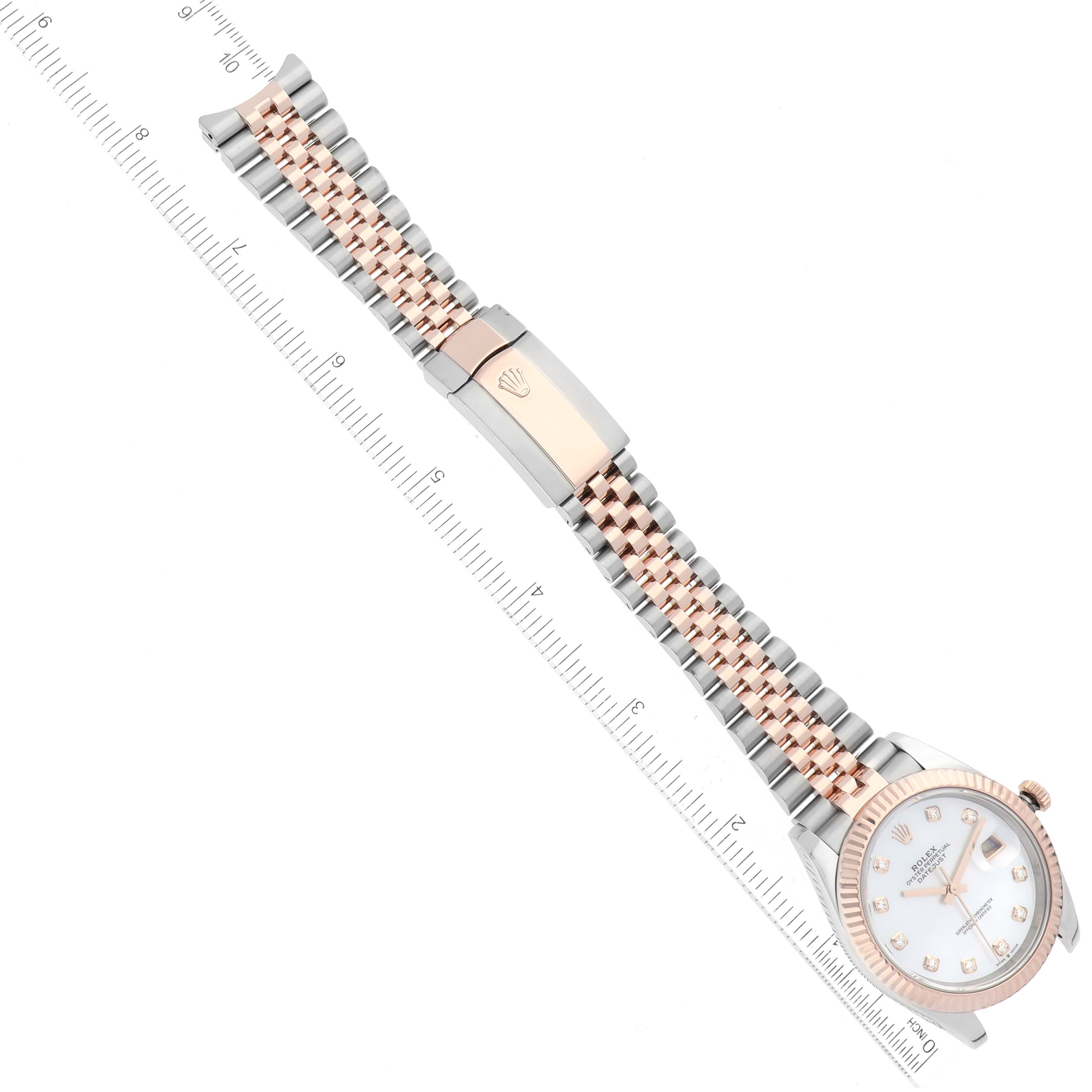 The Rolex Datejust 41 126331 Men's Steel and Gold (two tone) Mother of Pearl Dial 126331 Men's Steel and Gold (two tone) Mother of Pearl Dial watch is shown from a top-down angle, highlighting the face, two-tone Jubilee bracelet, and clasp.