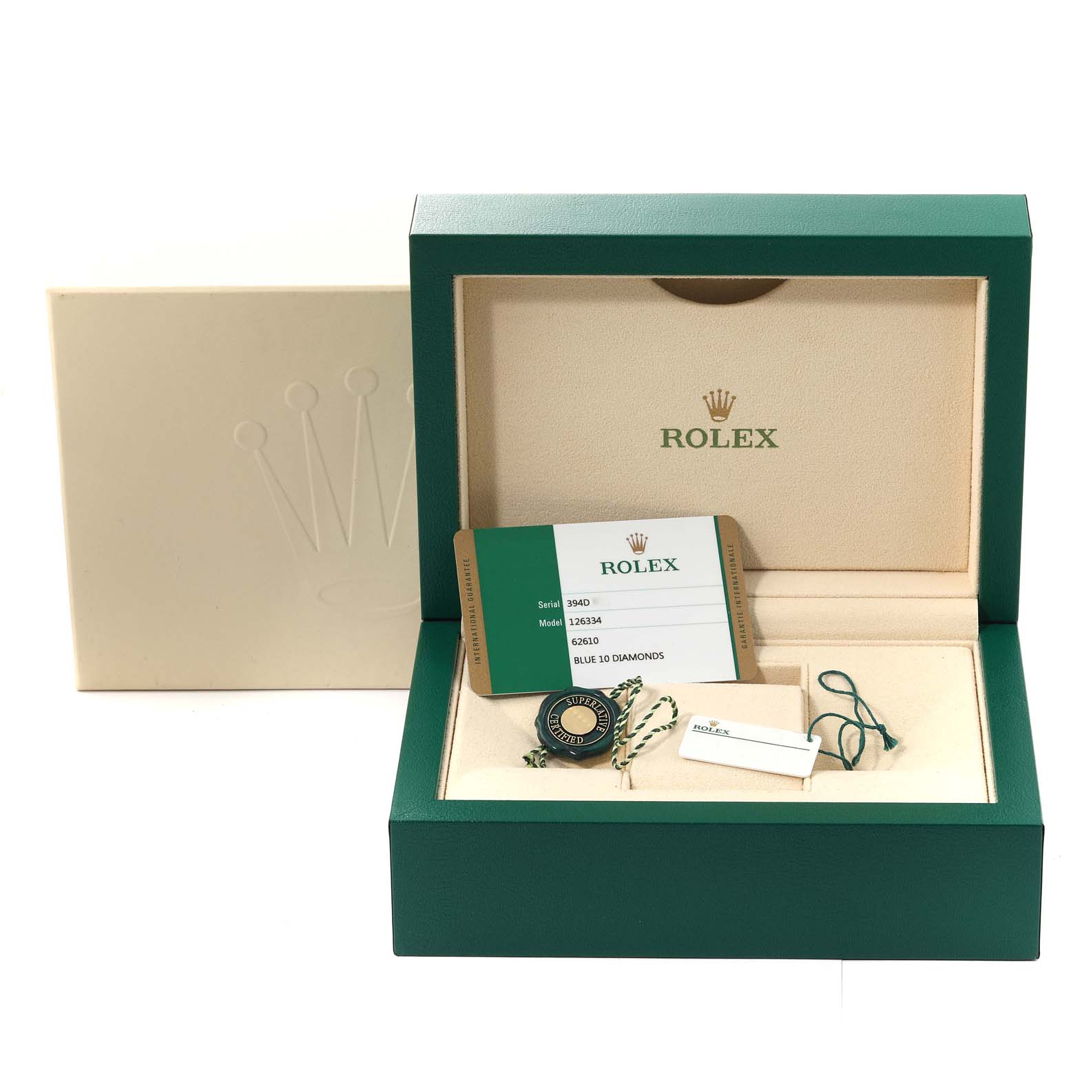 The image shows a green Rolex box for the Datejust 41 model, containing warranty cards and tags, with the outer box also visible.