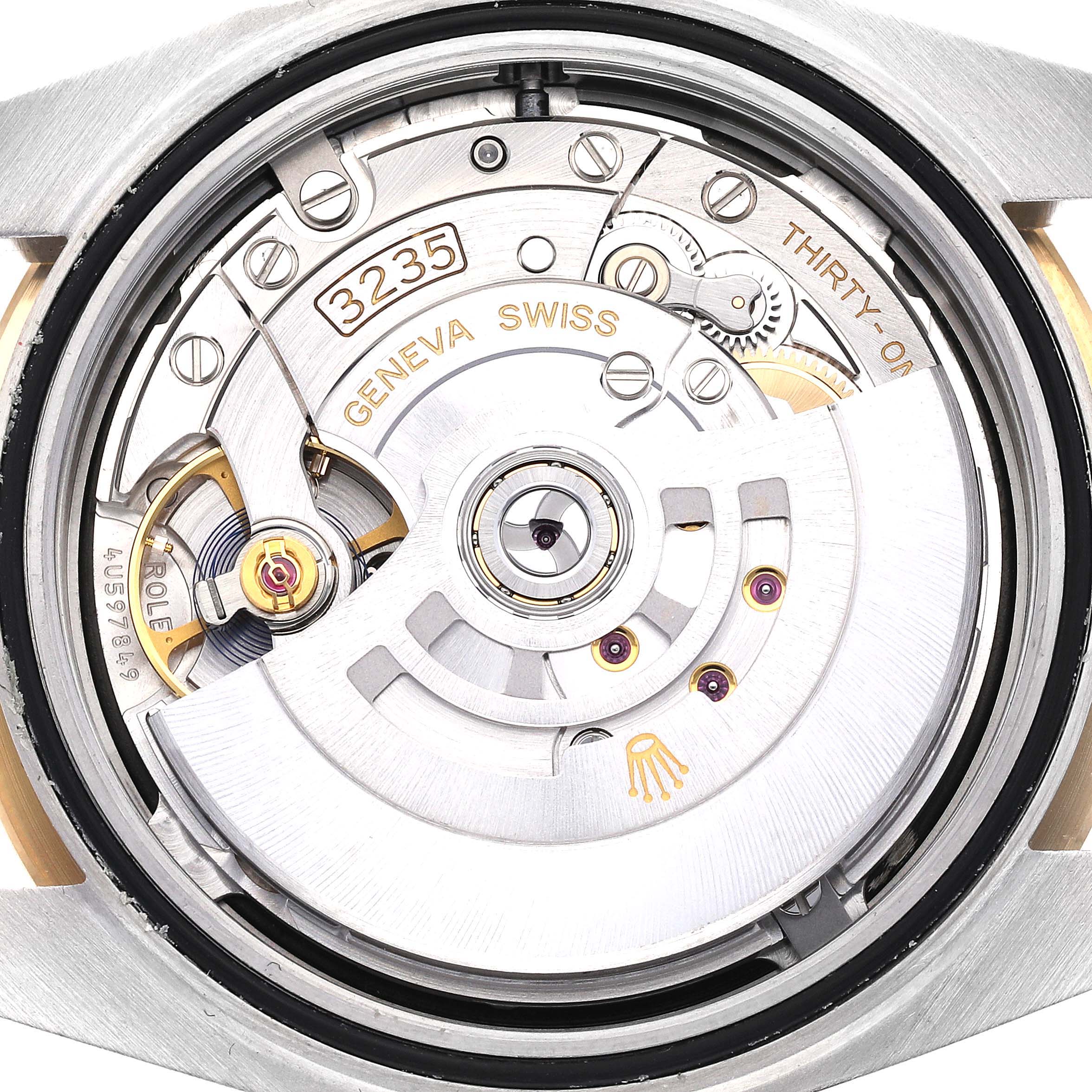 The image shows the movement mechanism of a Rolex Datejust 41 126333 Men's Steel and Gold (two tone) Black Dial 126333 Men's Steel and Gold (two tone) Black Dial watch, viewed from the back.