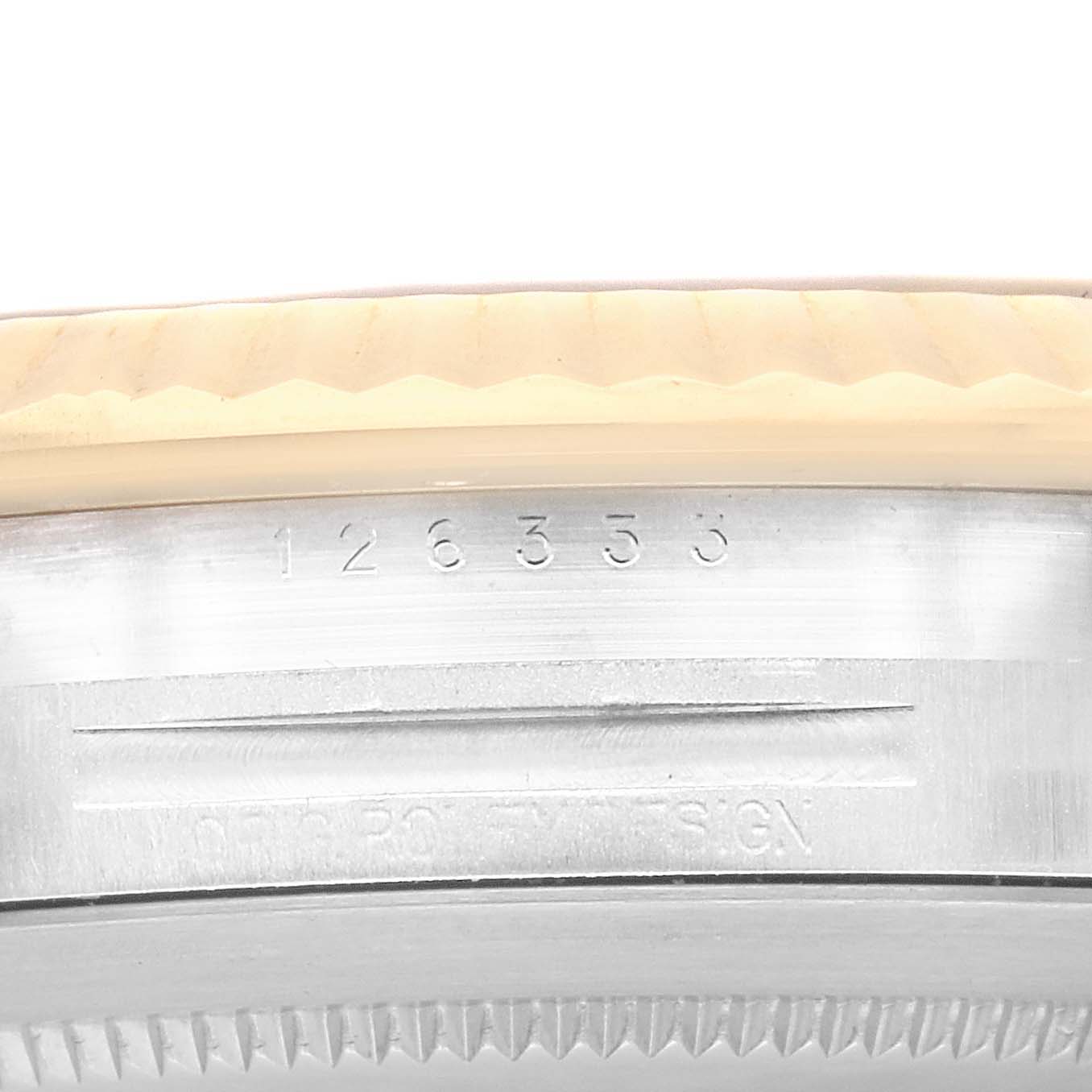 This close-up image of the Rolex Datejust 41 126333 Men's Steel and Gold (two tone) Black Dial 126333 Men's Steel and Gold (two tone) Black Dial shows the model number engraved on the case edge near the bezel.