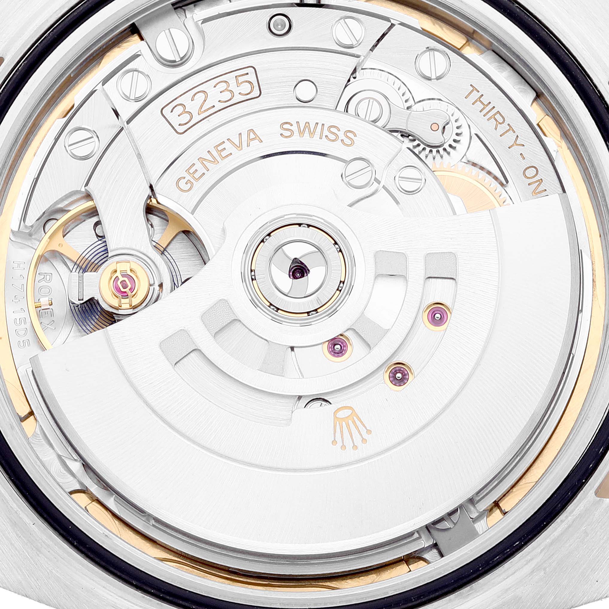 This image shows the Rolex Datejust 41 126333 Men's Steel and Gold (two tone) White Dial 126333 Men's Steel and Gold (two tone) White Dial's movement mechanism, viewed from the back.