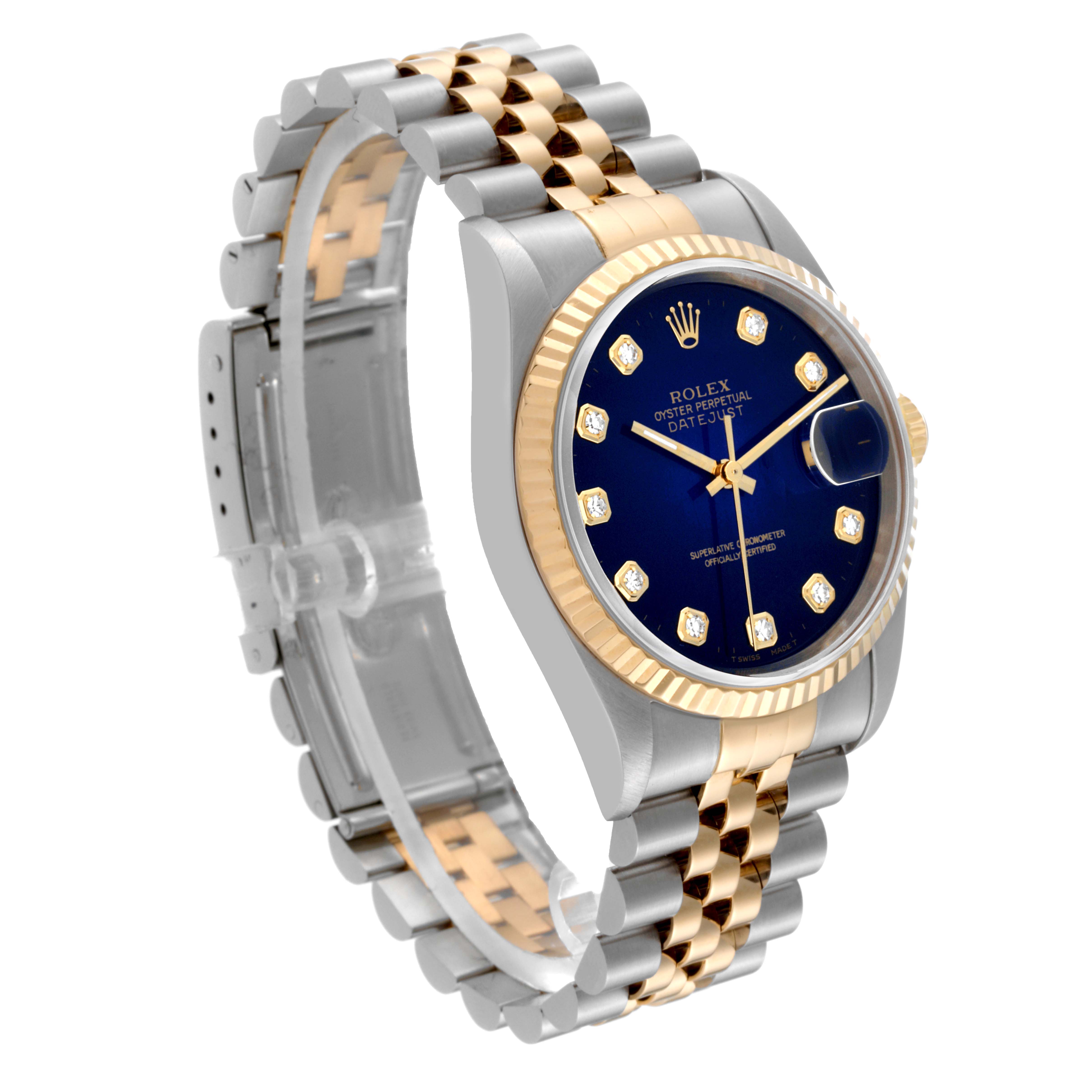 The image shows a Rolex Datejust 16233 Men's Steel and Gold (two tone) Blue Dial 16233 Men's Steel and Gold (two tone) Blue Dial watch from an angled side view, displaying its blue dial, fluted bezel, and two-tone Jubilee bracelet.