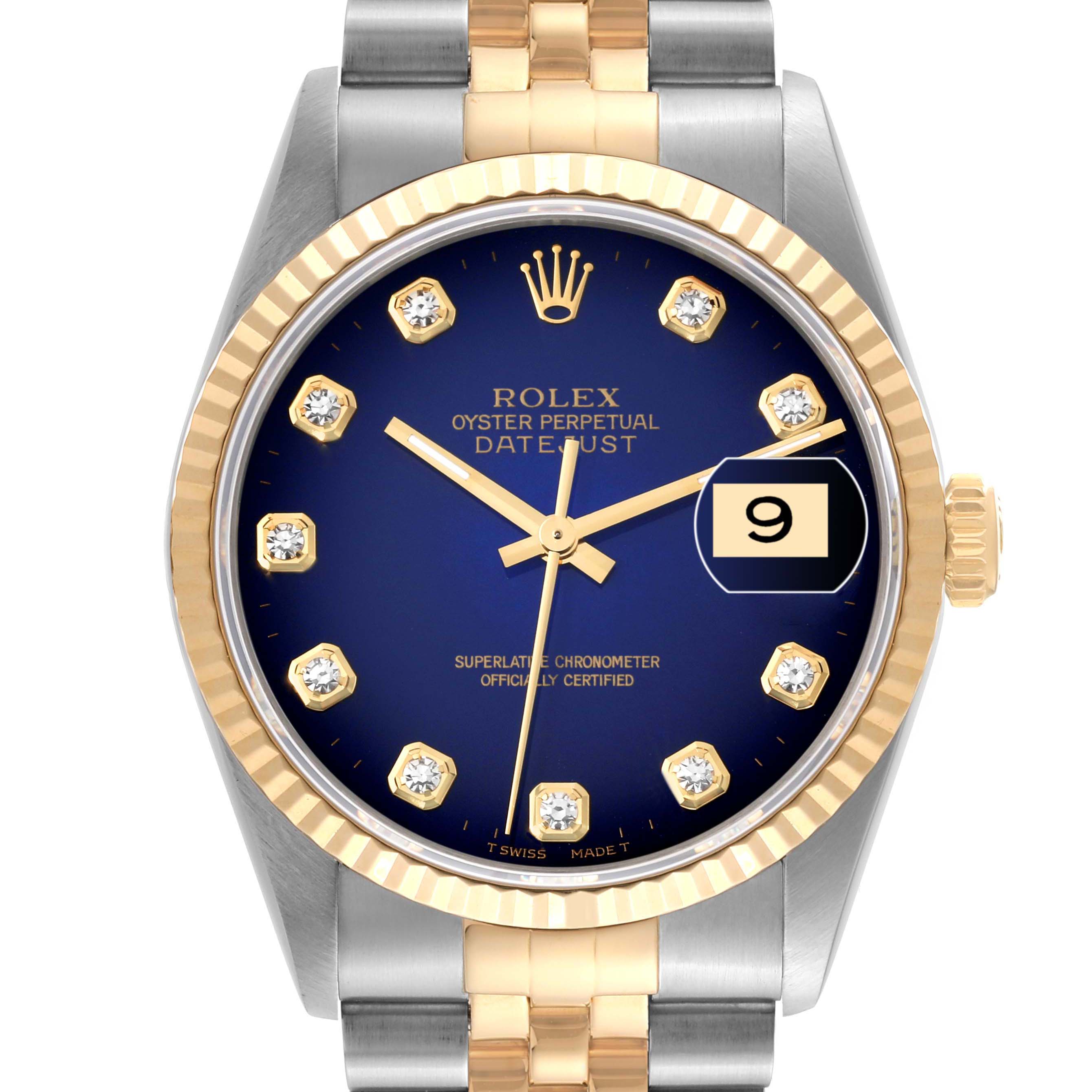 The image shows a Rolex Datejust 16233 Men's Steel and Gold (two tone) Blue Dial 16233 Men's Steel and Gold (two tone) Blue Dial watch from a front angle, highlighting its blue dial, gold markers, bezel, and bi-metal bracelet.