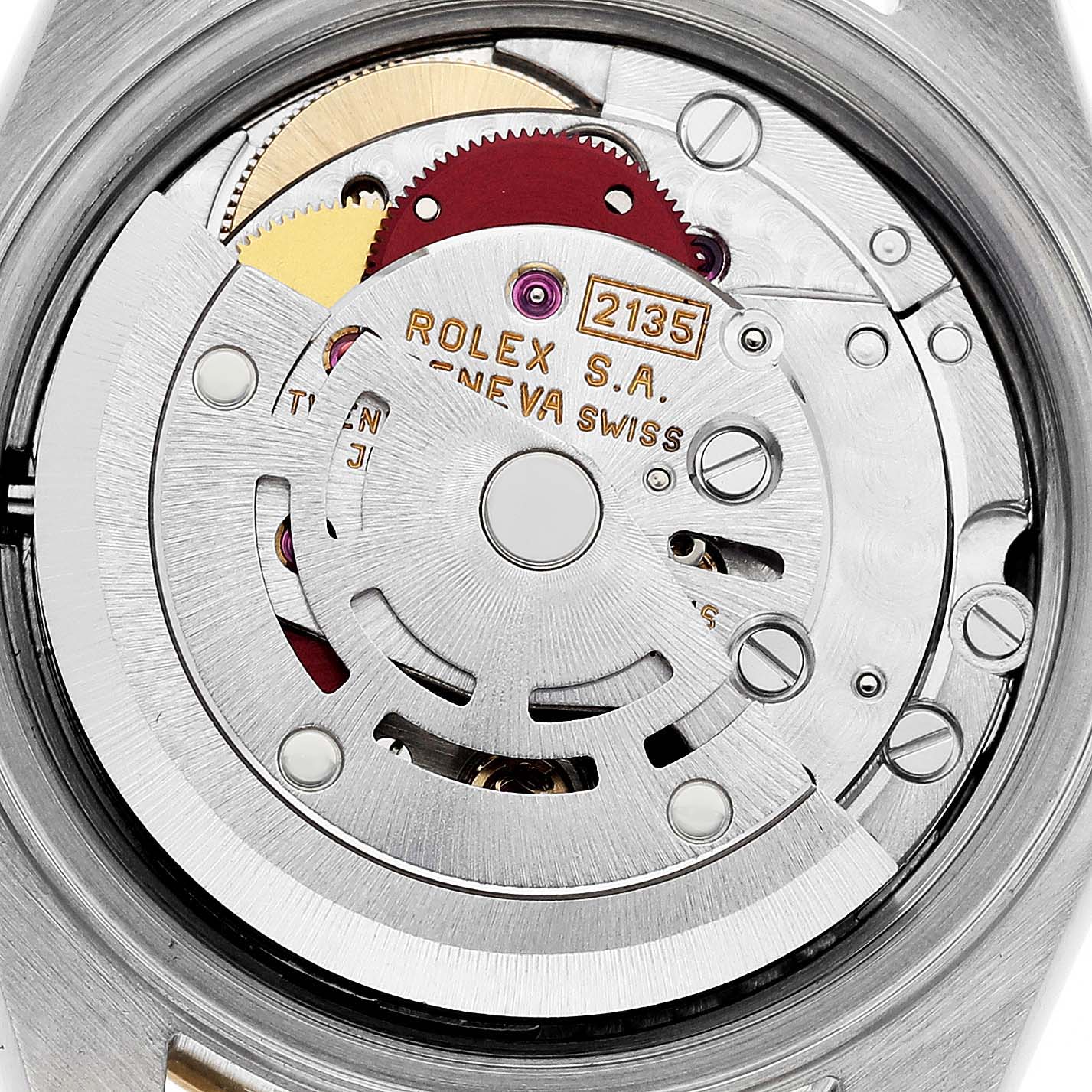 The back view of the Rolex Datejust 69173 Women's Steel and Gold (two tone) Grey Dial 69173 Women's Steel and Gold (two tone) Grey Dial watch showing its intricate movement and parts, including the rotor and gears.