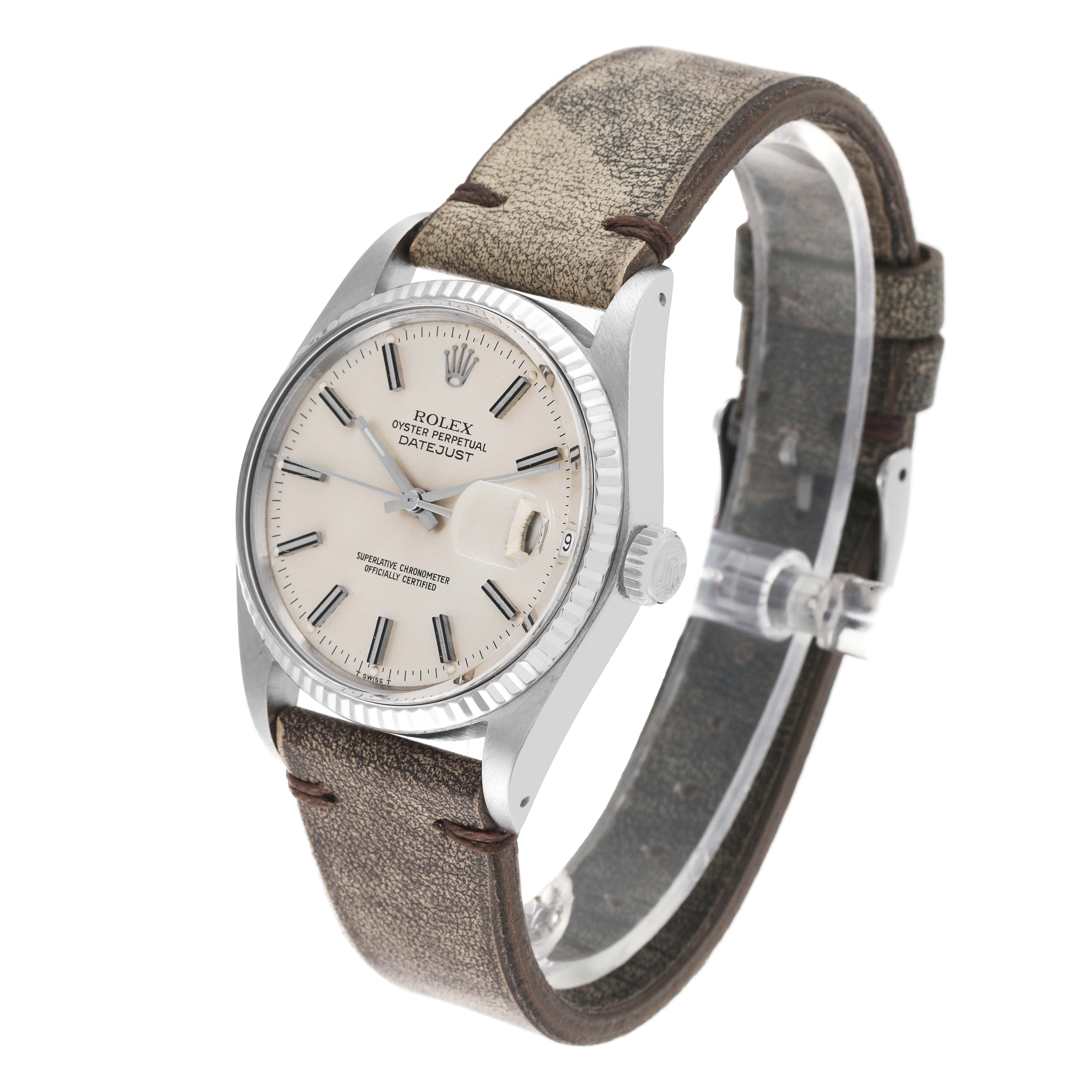 The image shows a side-angle view of the Rolex Vintage Collection 16014 Men's Stainless Steel Silver Dial 16014 Men's Stainless Steel Silver Dial model with its face, bezel, crown, and leather strap visible.