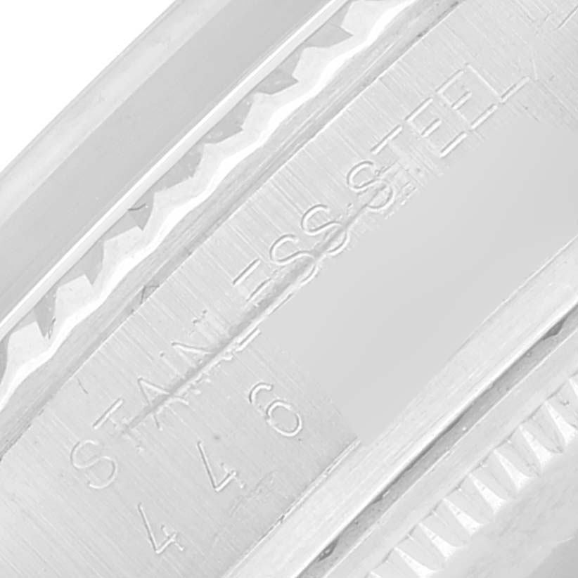 The image shows an angled close-up of the case back of the Rolex Vintage Collection 16014 Men's Stainless Steel Silver Dial 16014 Men's Stainless Steel Silver Dial model, highlighting the stainless steel engraving.