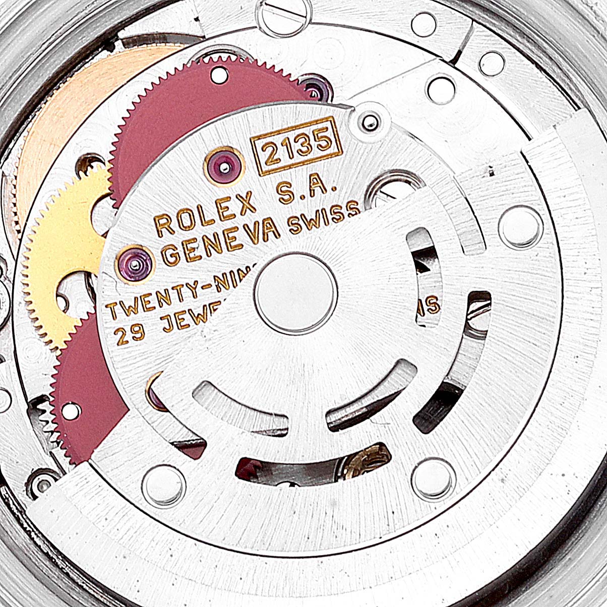 This image shows the inner movement and gears of the Rolex Datejust 69173 Women's Steel and Gold (two tone) Champagne Dial 69173 Women's Steel and Gold (two tone) Champagne Dial watch, specifically the rotor and mechanisms.