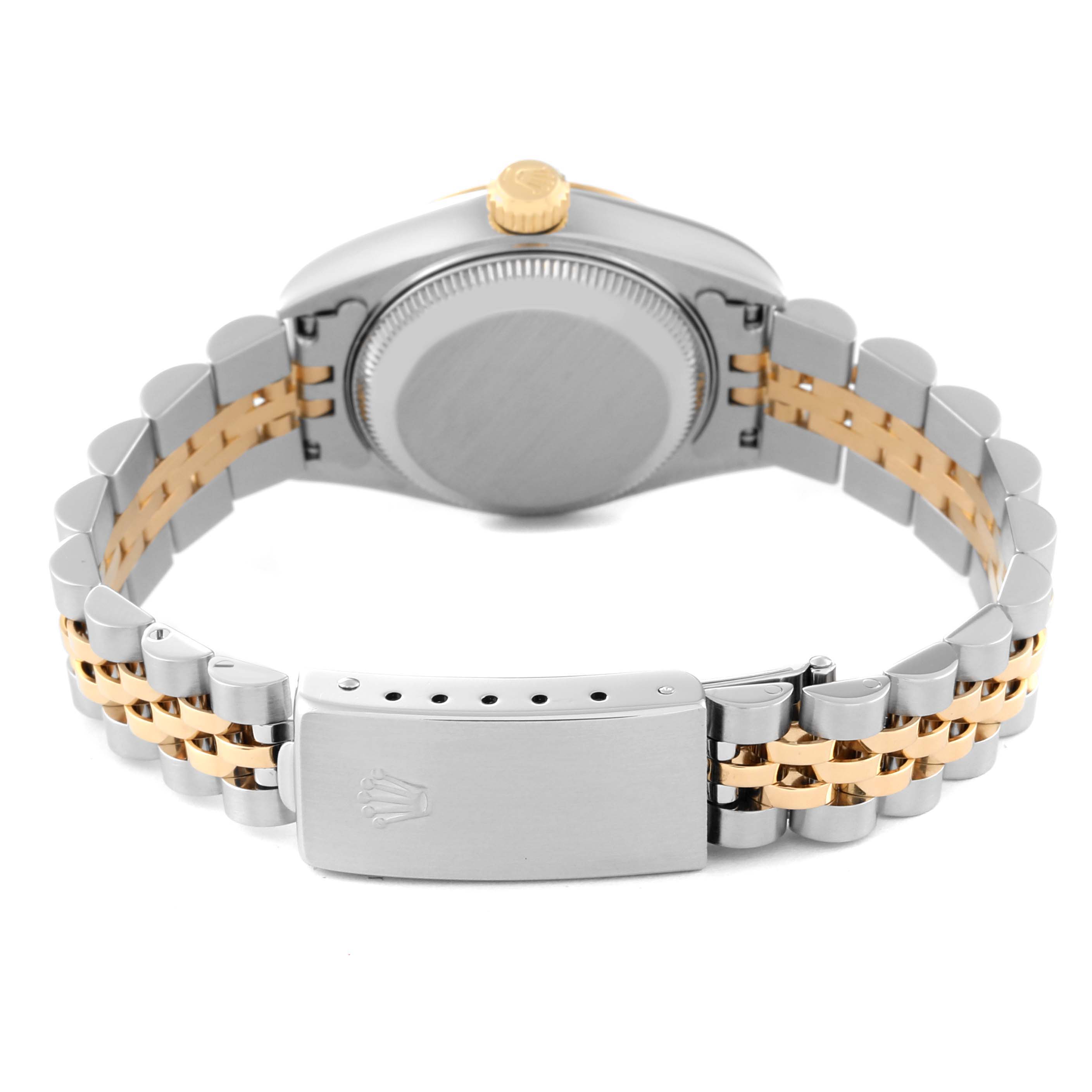 This image shows the back case, crown, and bracelet clasp of a Rolex Datejust 79173 Women's Steel and Gold (two tone) Grey Dial 79173 Women's Steel and Gold (two tone) Grey Dial watch.