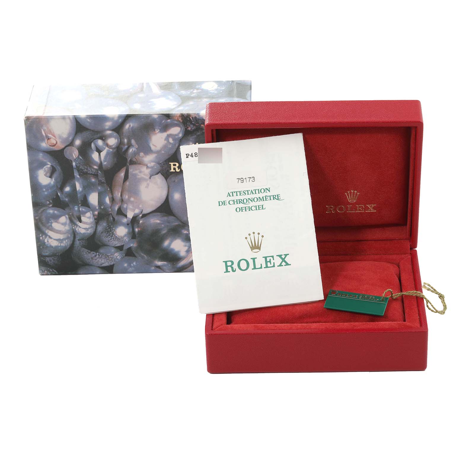 The image shows a Rolex Datejust 79173 Women's Steel and Gold (two tone) White Dial 79173 Women's Steel and Gold (two tone) White Dial box set including a red watch box, an exterior box, a certificate, and a green tag.