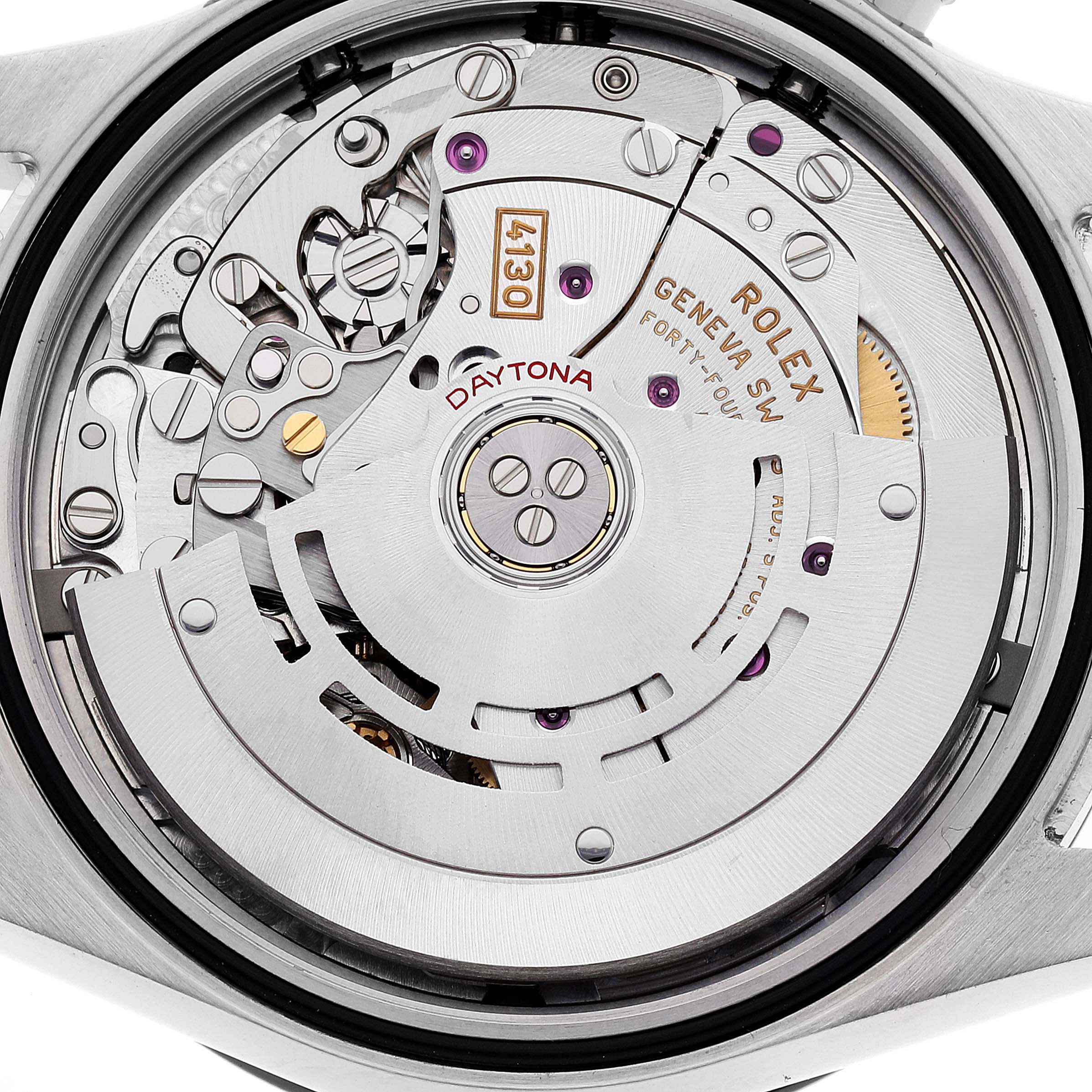 The image shows an interior view of the Rolex Daytona 116500 Men
s Stainless Steel White Dial 116500 Men
s Stainless Steel White Dial movement, highlighting components such as gears, rotors, and inscriptions.