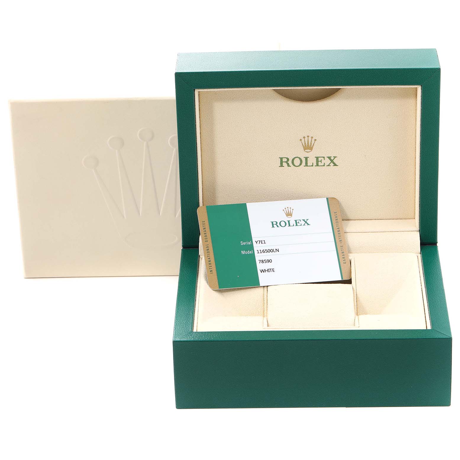 The image shows an open green Rolex watch box for the Daytona model, displaying a warranty card inside.