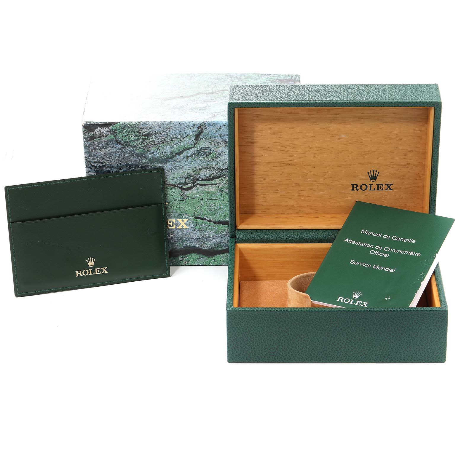 The image shows an open Rolex GMT-Master 16710 Men
s Stainless Steel Black Dial 16710 Men
s Stainless Steel Black Dial box with its packaging, warranty cardholder, and manuals.