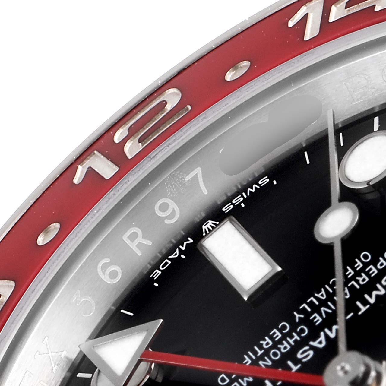 This close-up angle shows the numerals, bezel, part of the chapter ring, and the GMT hand of the Rolex GMT-Master 126710 Men
s Stainless Steel Black Dial 126710 Men
s Stainless Steel Black Dial watch.