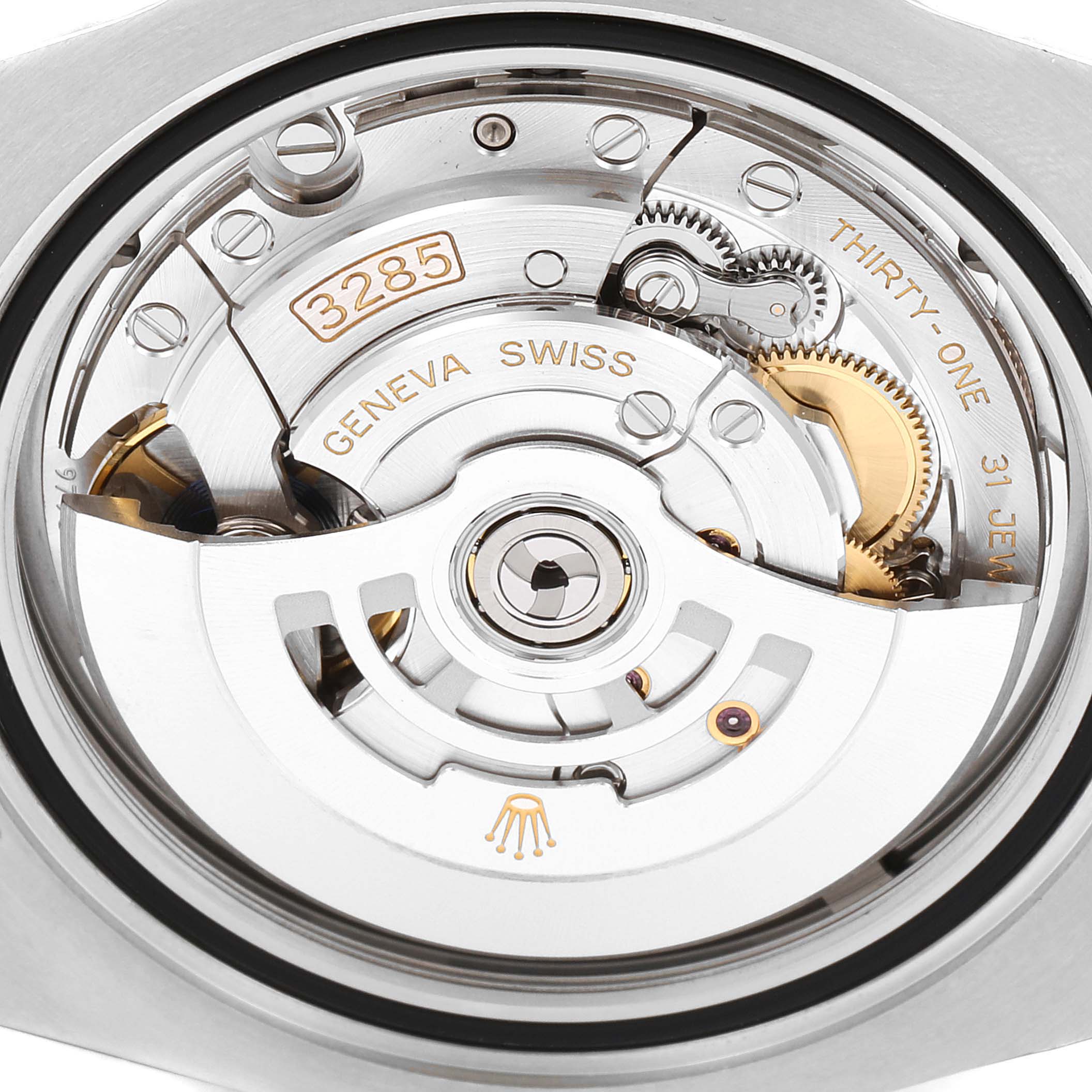 The image shows the back of a Rolex GMT-Master 126710 Men
s Stainless Steel Black Dial 126710 Men
s Stainless Steel Black Dial watch, featuring its intricate inner mechanical movement and parts.