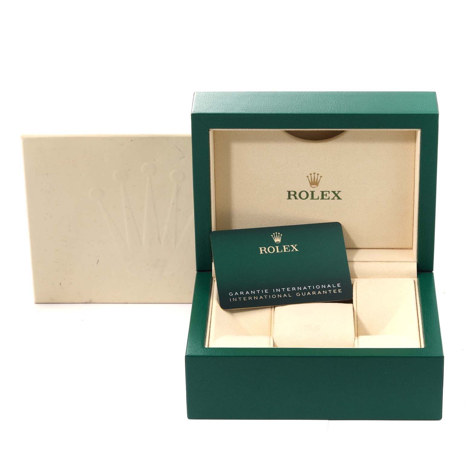 The image shows the open packaging box for the Rolex Oyster Perpetual 126000 Men's Stainless Steel Black Dial 126000 Men's Stainless Steel Black Dial watch with its international guarantee card inside.