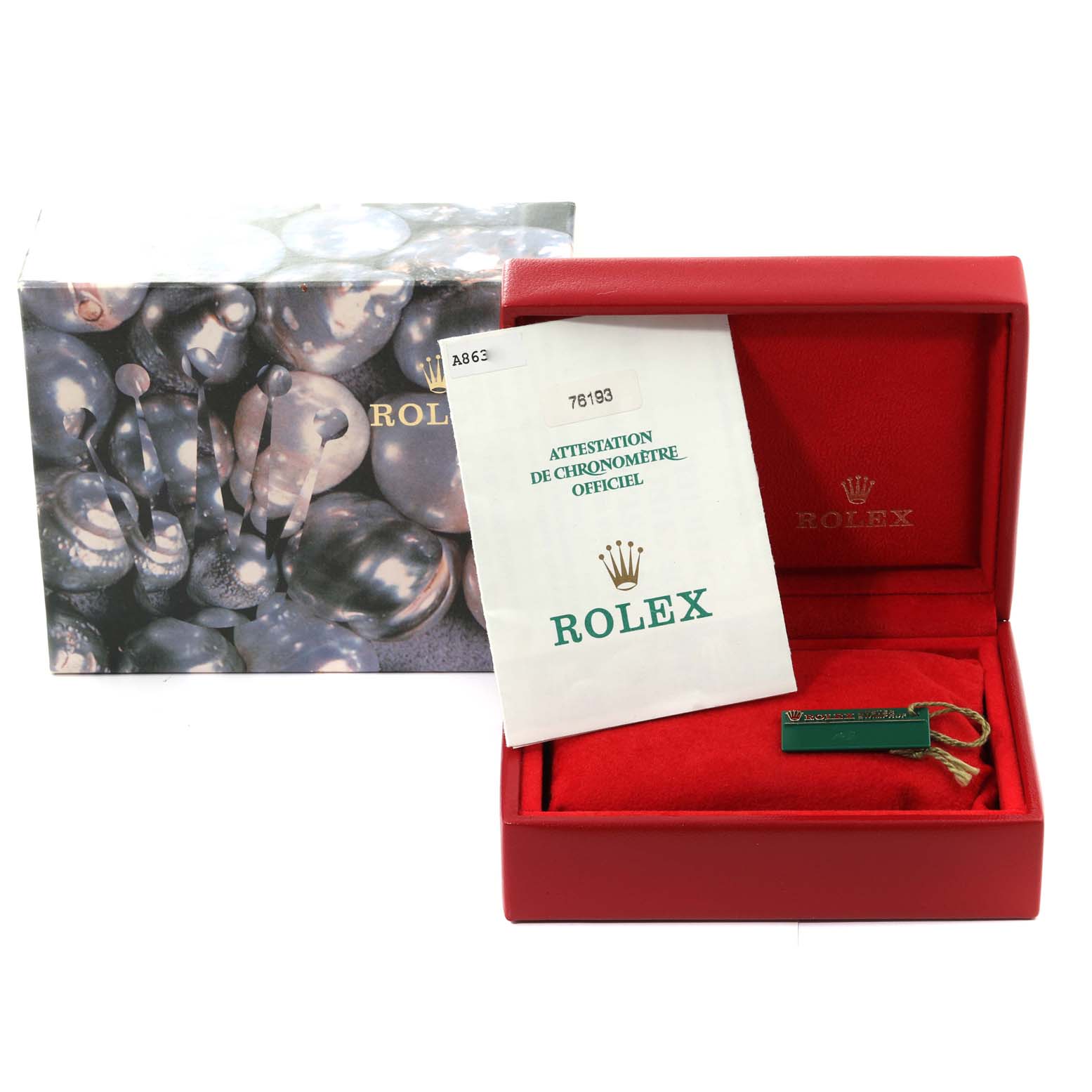 This image features the box, authentication papers, and an accessory tag for a Rolex Oyster Perpetual 76193 Women's Stainless Steel Grey Dial 76193 Women's Stainless Steel Grey Dial watch.