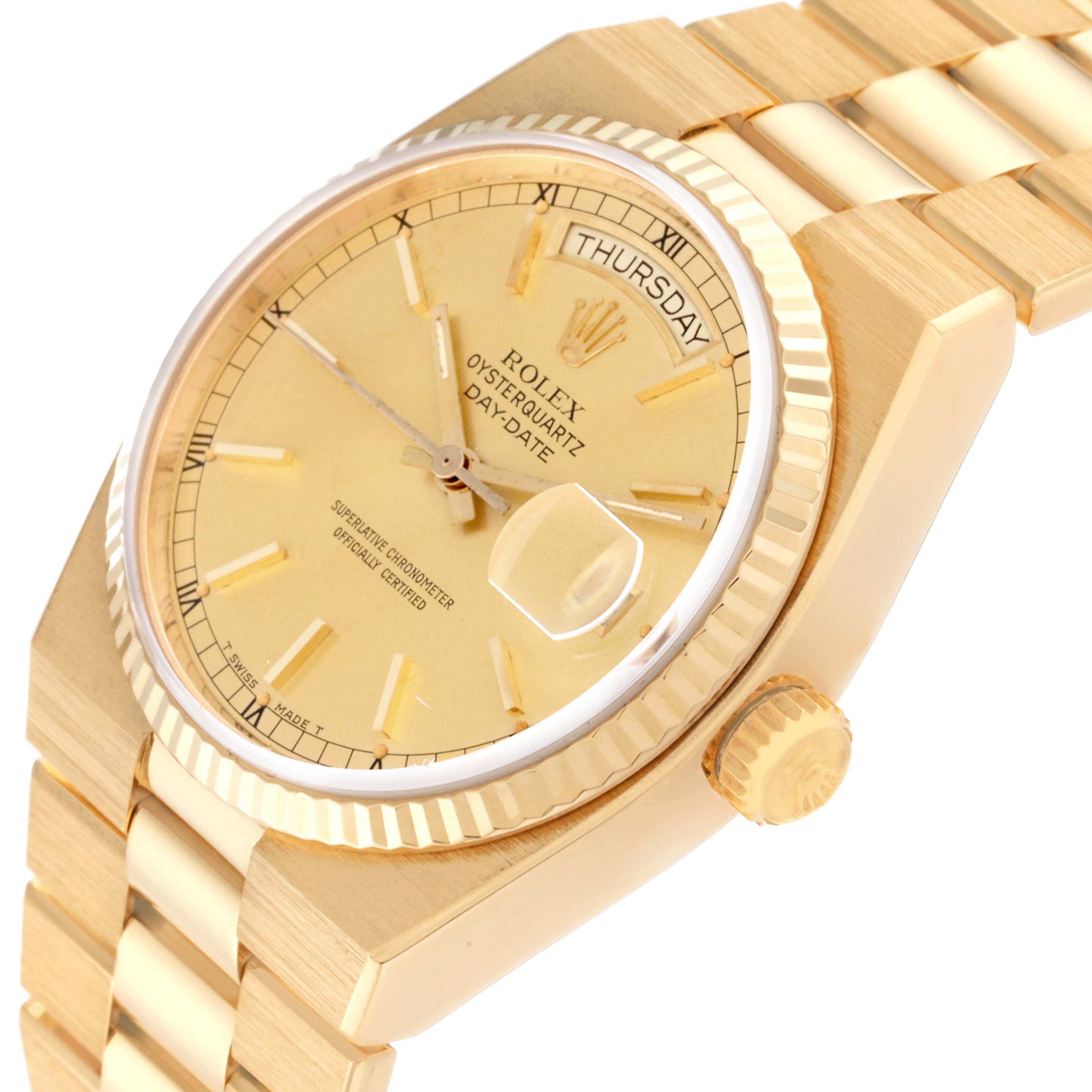 The image shows a close-up, angled view of a Rolex Oysterquartz 19018 Men's Yellow Gold Champagne Dial 19018 Men's Yellow Gold Champagne Dial watch, highlighting the dial, bezel, and bracelet.