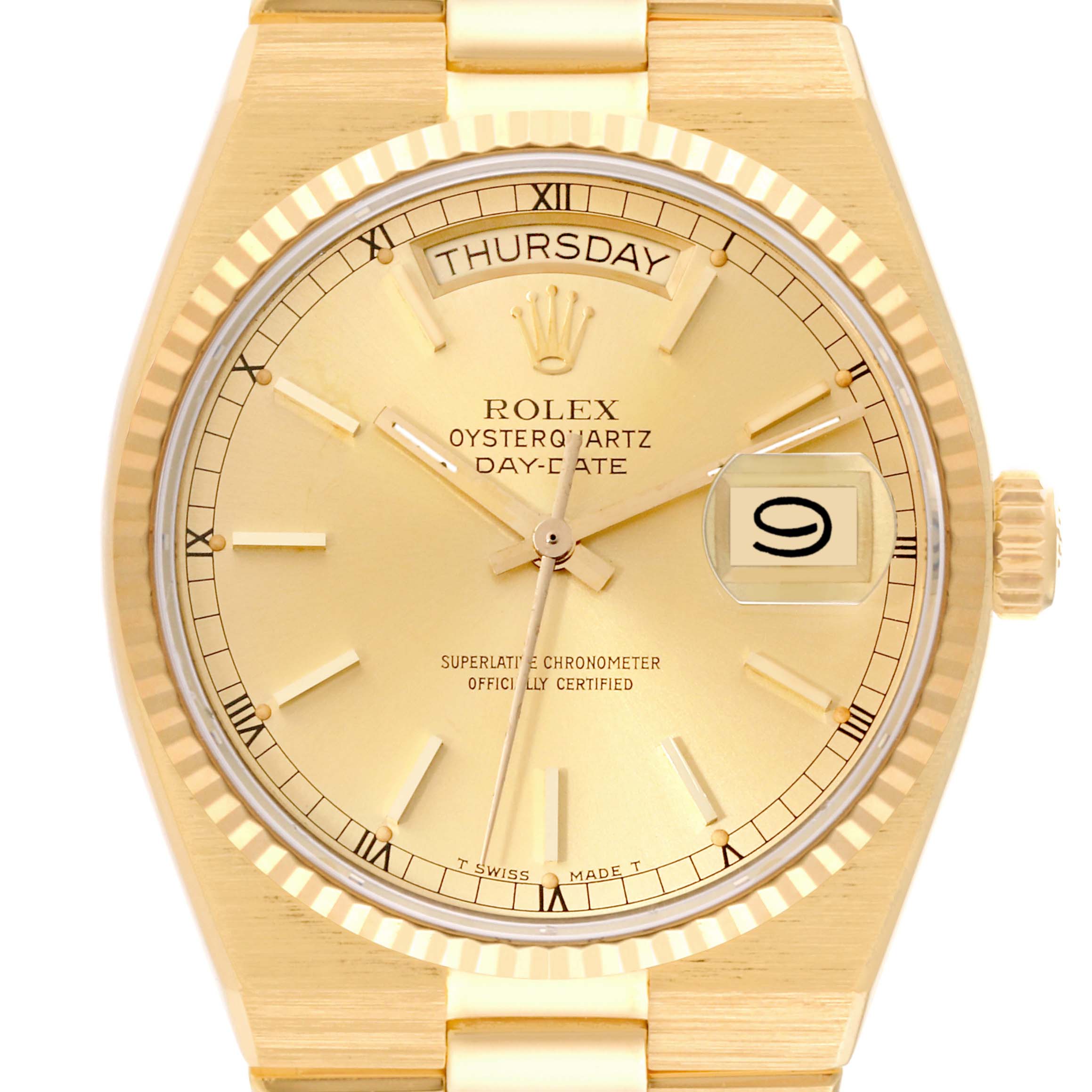 This image shows a front view of the Rolex Oysterquartz 19018 Men's Yellow Gold Champagne Dial 19018 Men's Yellow Gold Champagne Dial watch, displaying the dial, hands, day, and date.