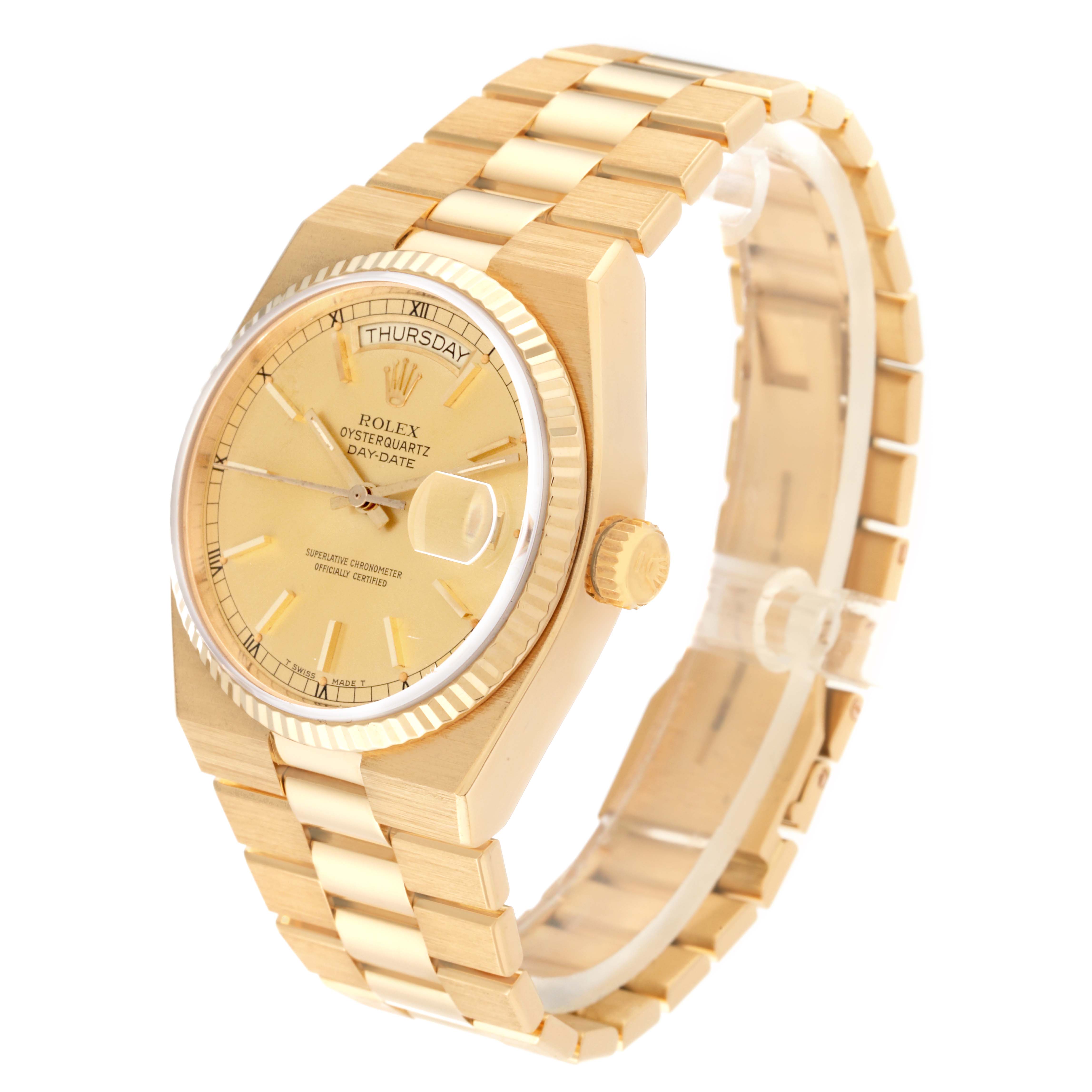 The Rolex Oysterquartz 19018 Men's Yellow Gold Champagne Dial 19018 Men's Yellow Gold Champagne Dial watch is shown at an angled side view, displaying the face, crown, and part of the bracelet.