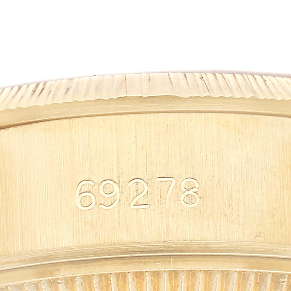 This is a close-up of the Rolex President 69278 Women's Yellow Gold White Dial 69278 Women's Yellow Gold White Dial model watch, showing its reference number 69278 engraved on the case.