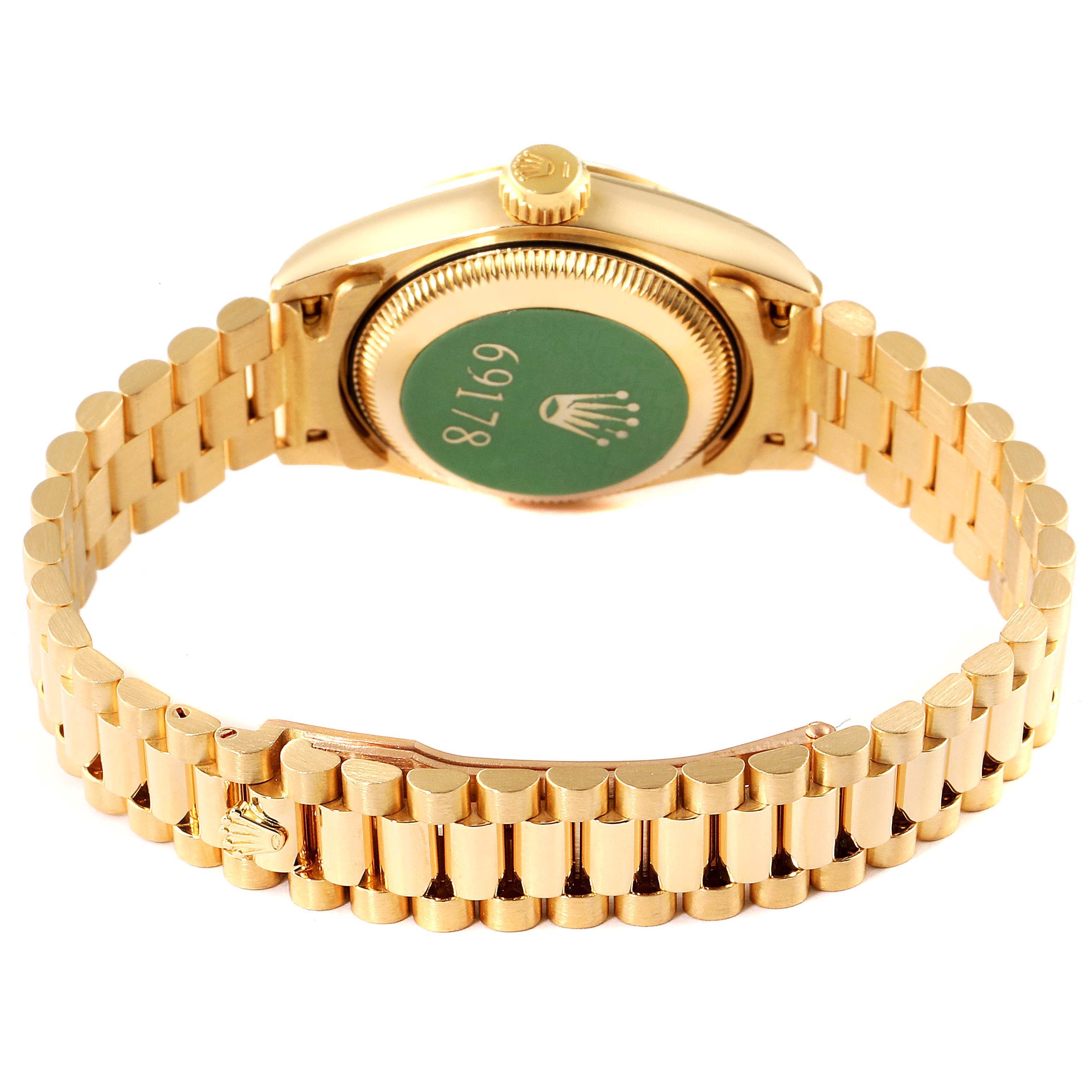 The image shows the back and bracelet of a Rolex President 69178 Women
s Yellow Gold Champagne Dial 69178 Women
s Yellow Gold Champagne Dial model, highlighting the clasp and caseback.