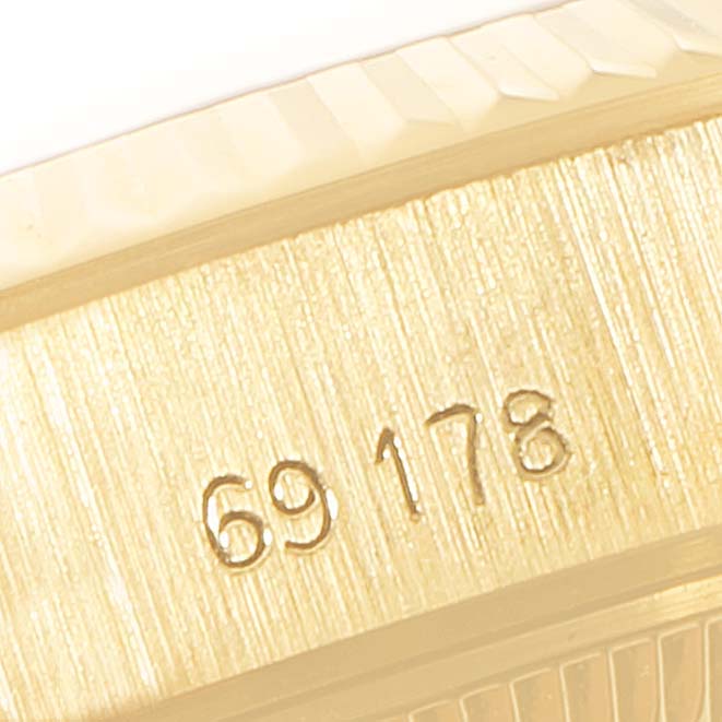 This is a close-up of the side of a Rolex President 69178 Women
s Yellow Gold Champagne Dial 69178 Women
s Yellow Gold Champagne Dial model watch, showing the model number 69178.