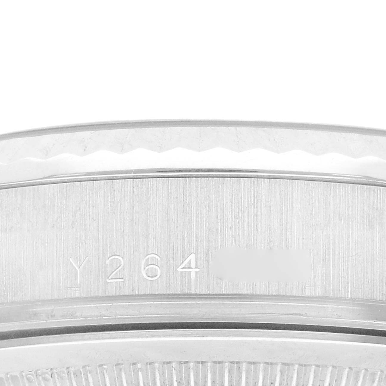 The image shows a close-up side view of the bezel and part of the case back, including the serial number, on a Rolex President 118239 Men's White Gold Silver Dial 118239 Men's White Gold Silver Dial model.