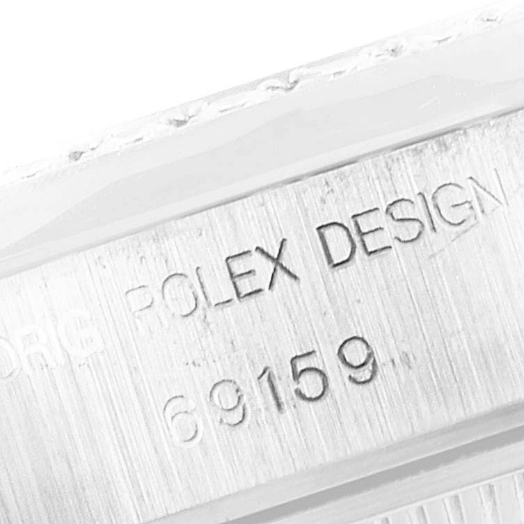 This image shows a close-up of the case where the serial number is engraved on a Rolex President 69159 Women
s White Gold Silver Dial 69159 Women
s White Gold Silver Dial model watch.