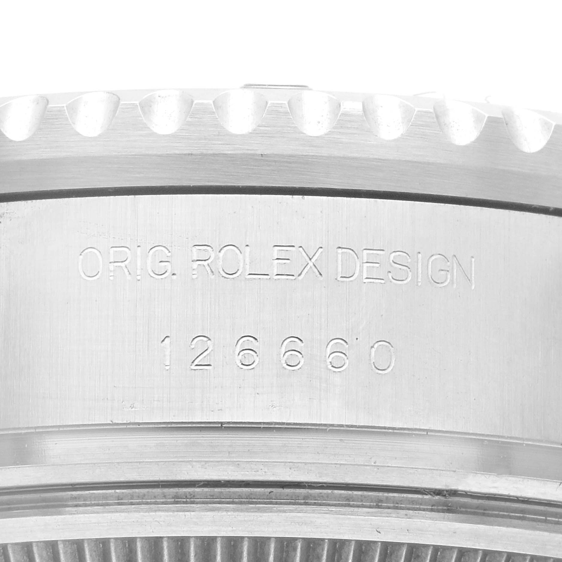 The image shows an angled close-up of the casing with the model number and design inscription of a Rolex Sea-Dweller 126660 Men
s Stainless Steel Black Dial 126660 Men
s Stainless Steel Black Dial watch.