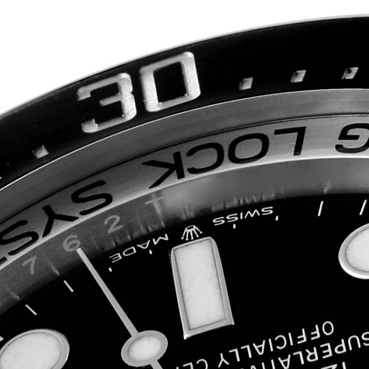 The image shows a partial close-up of the bezel, dial, and markings of the Rolex Sea-Dweller 126660 Men
s Stainless Steel Blue Dial 126660 Men
s Stainless Steel Blue Dial watch.