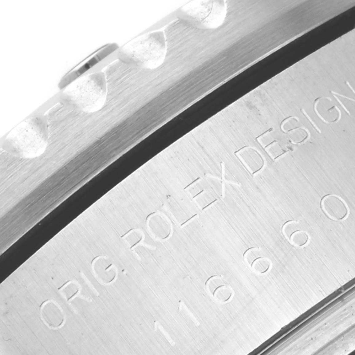 This is a close-up of the engraved case back of a Rolex Sea-Dweller 116660 Men
s Stainless Steel Black Dial 116660 Men
s Stainless Steel Black Dial, showcasing the model number and text.