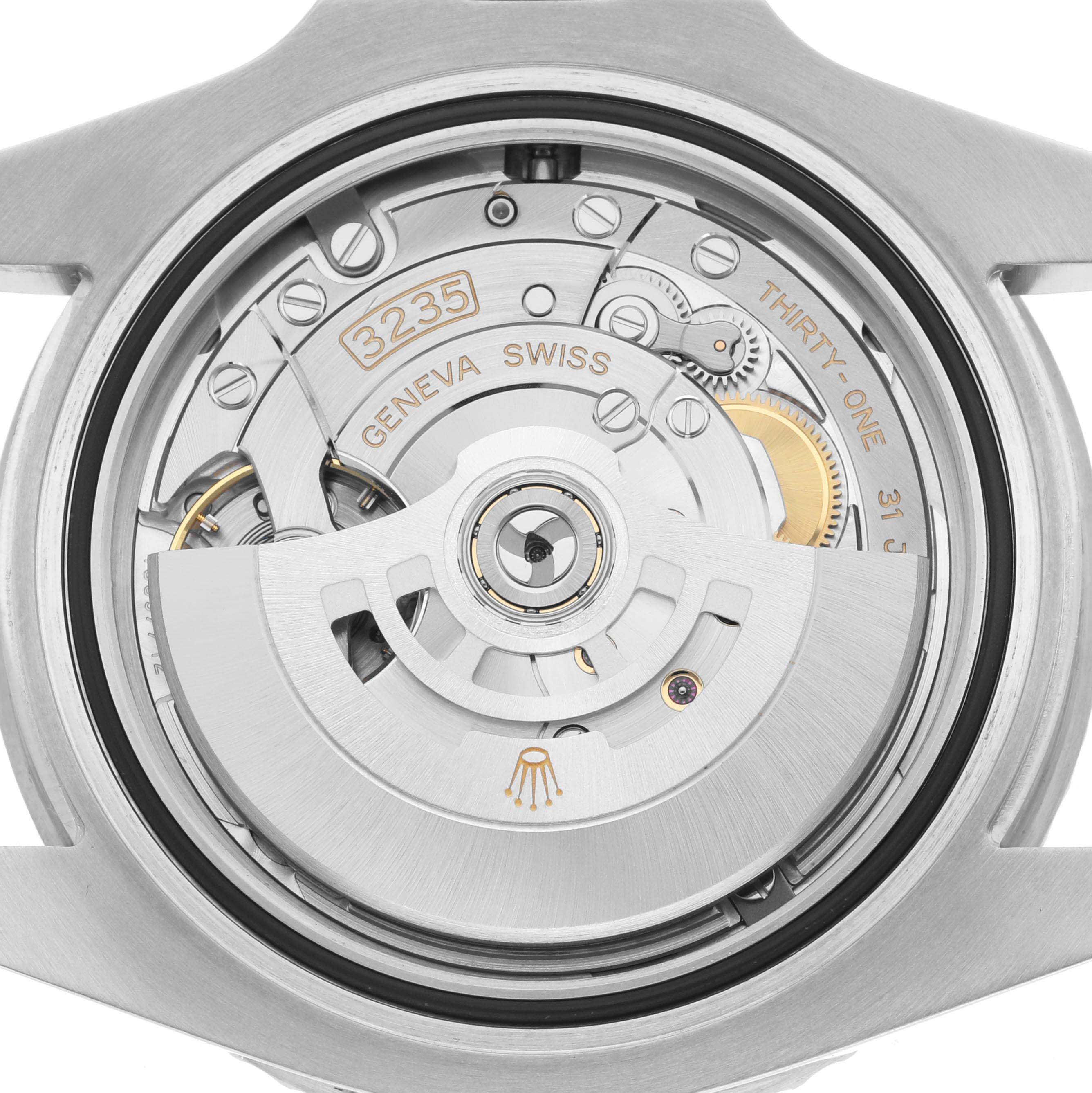 This image shows the case back of the Rolex Submariner 126610LN Men
s Stainless Steel Black Dial 126610LN Men
s Stainless Steel Black Dial, highlighting its intricate movement and rotor.