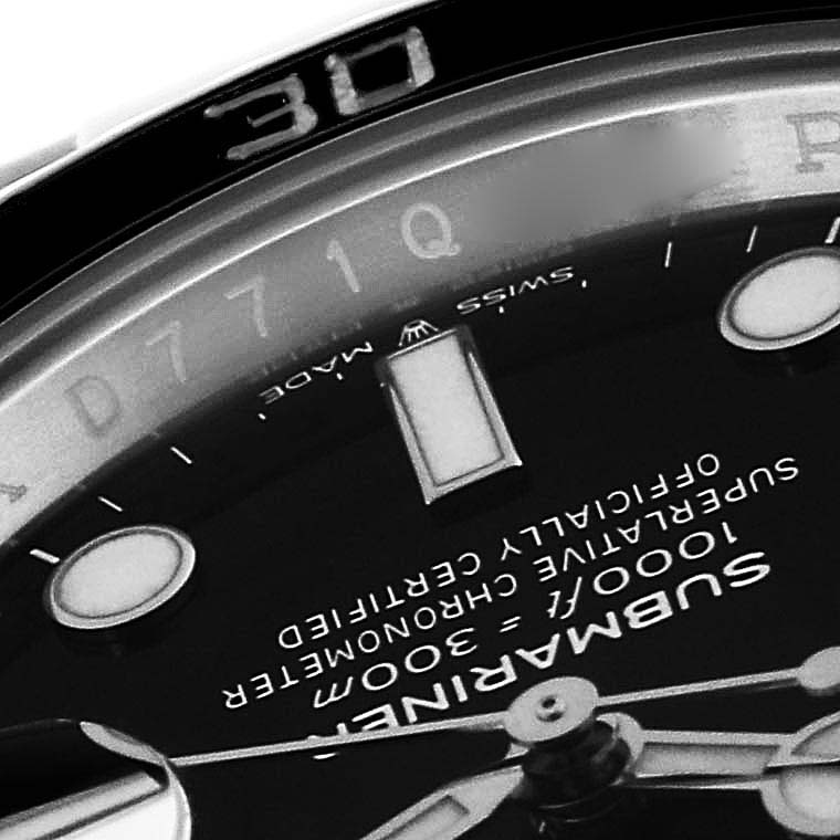 The image shows a close-up of the dial and part of the bezel of a Rolex Submariner 126610LN Men
s Stainless Steel Black Dial 126610LN Men
s Stainless Steel Black Dial.
