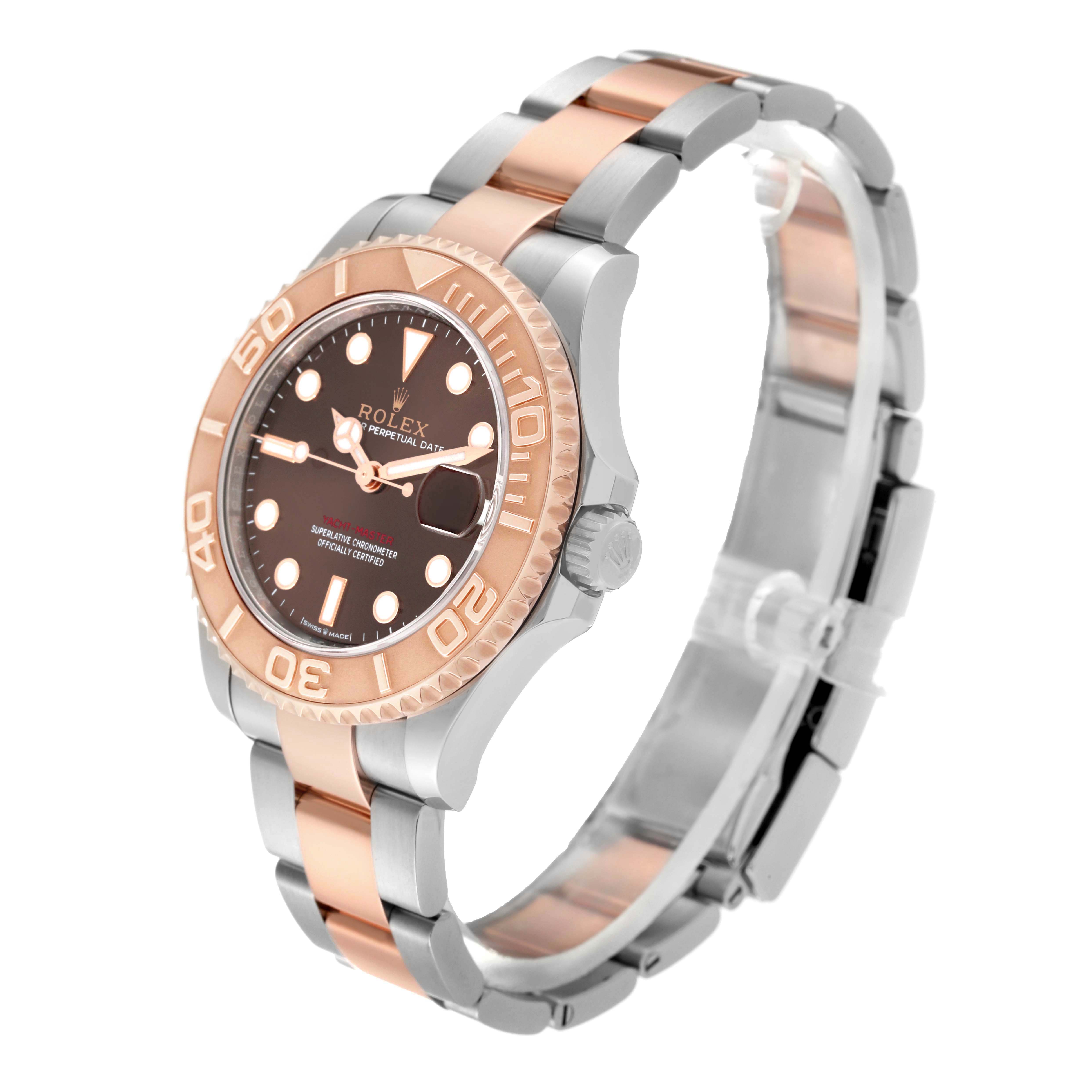 The Rolex Yacht-Master 268621 Men's Steel and Gold (two tone) Brown Dial watch is shown at a three-quarter angle, highlighting the bezel, dial, and bracelet.