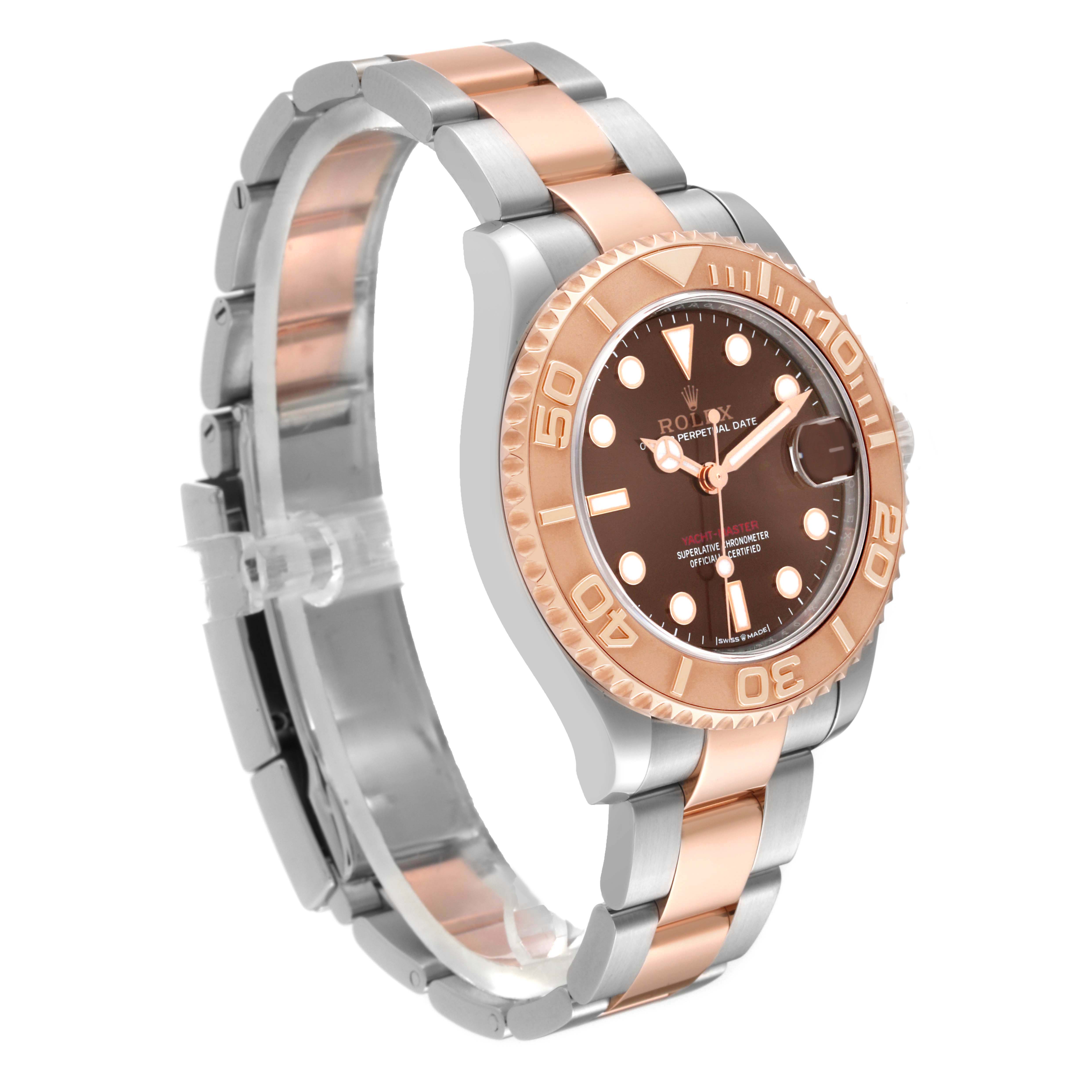 The Rolex Yacht-Master 268621 Men's Steel and Gold (two tone) Brown Dial watch is shown at a three-quarter angle, displaying the bezel, dial, and bracelet.
