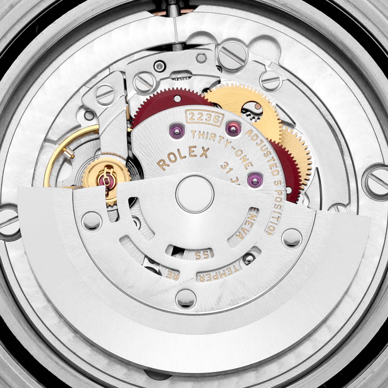 This image shows the intricate internal mechanism of a Rolex Yacht-Master 268621 Men's Steel and Gold (two tone) Brown Dial 268621 Men's Steel and Gold (two tone) Brown Dial watch, focusing on the gears and movement components.