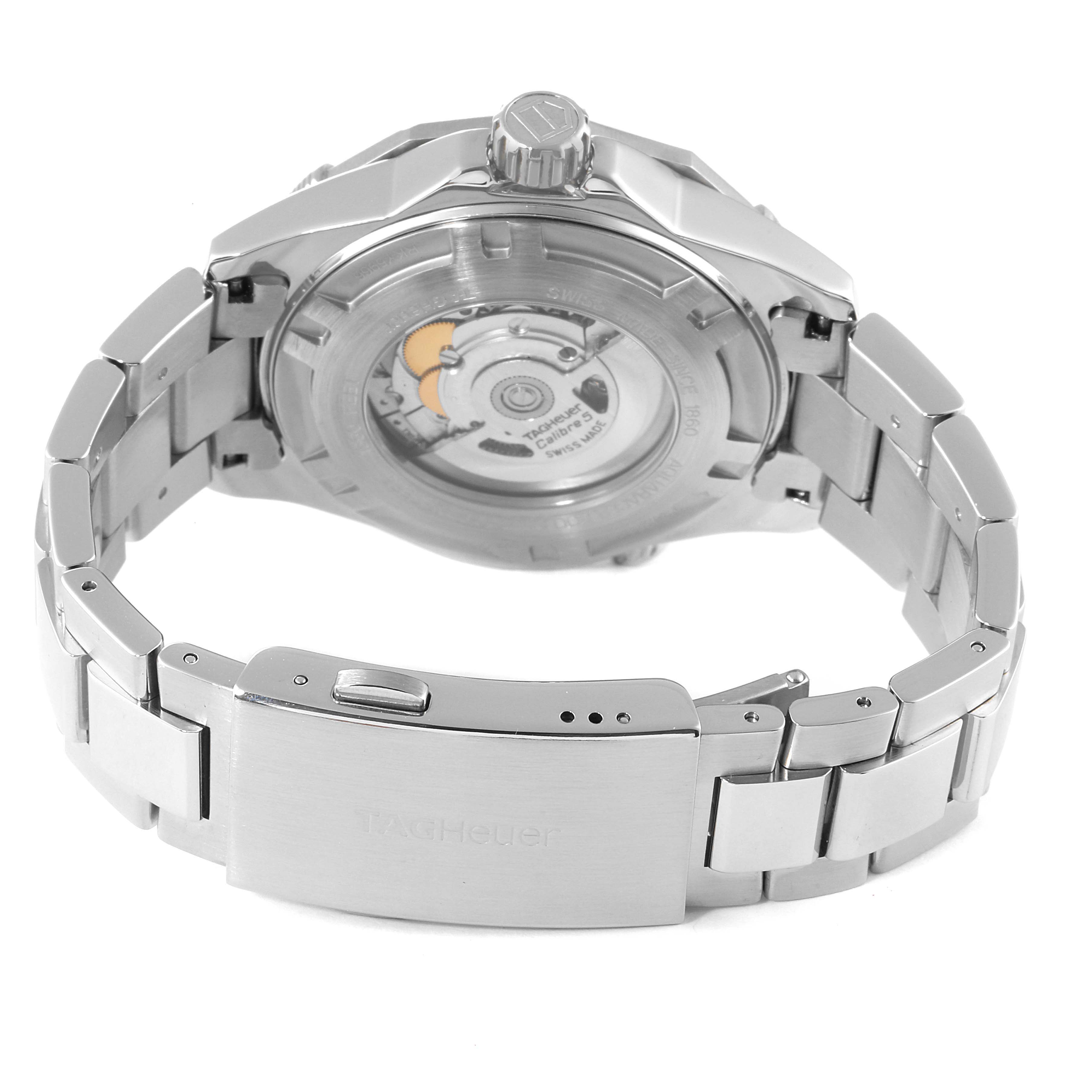 This image shows the back view of the Tag Heuer Aquaracer WAJ2114 Men's Stainless Steel Black Dial WAJ2114 Men's Stainless Steel Black Dial watch, highlighting its movement and stainless steel bracelet.
