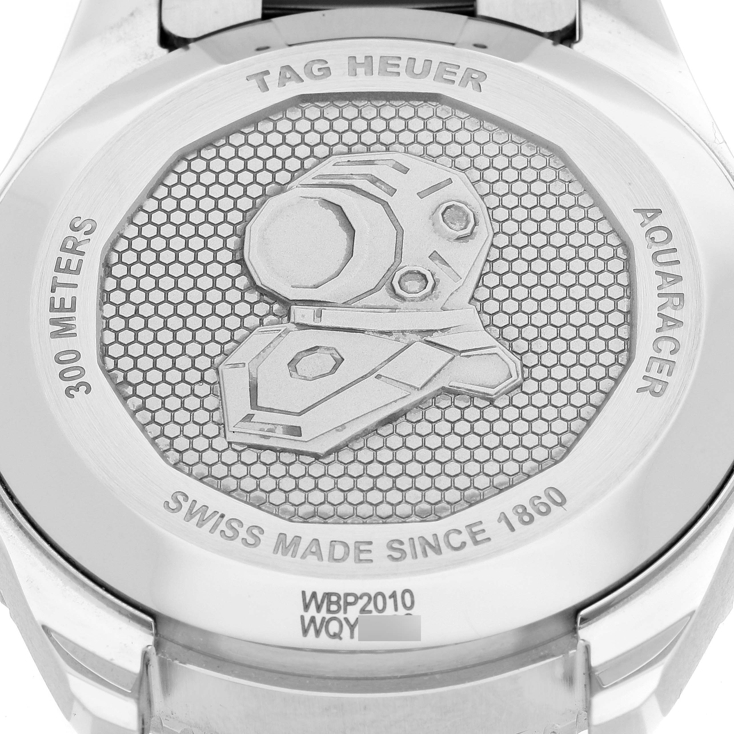 The image shows the case back of a Tag Heuer Aquaracer WBP2010.BA0632 Men's Stainless Steel Blue Dial WBP2010.BA0632 Men's Stainless Steel Blue Dial watch, highlighting its engravings and design.