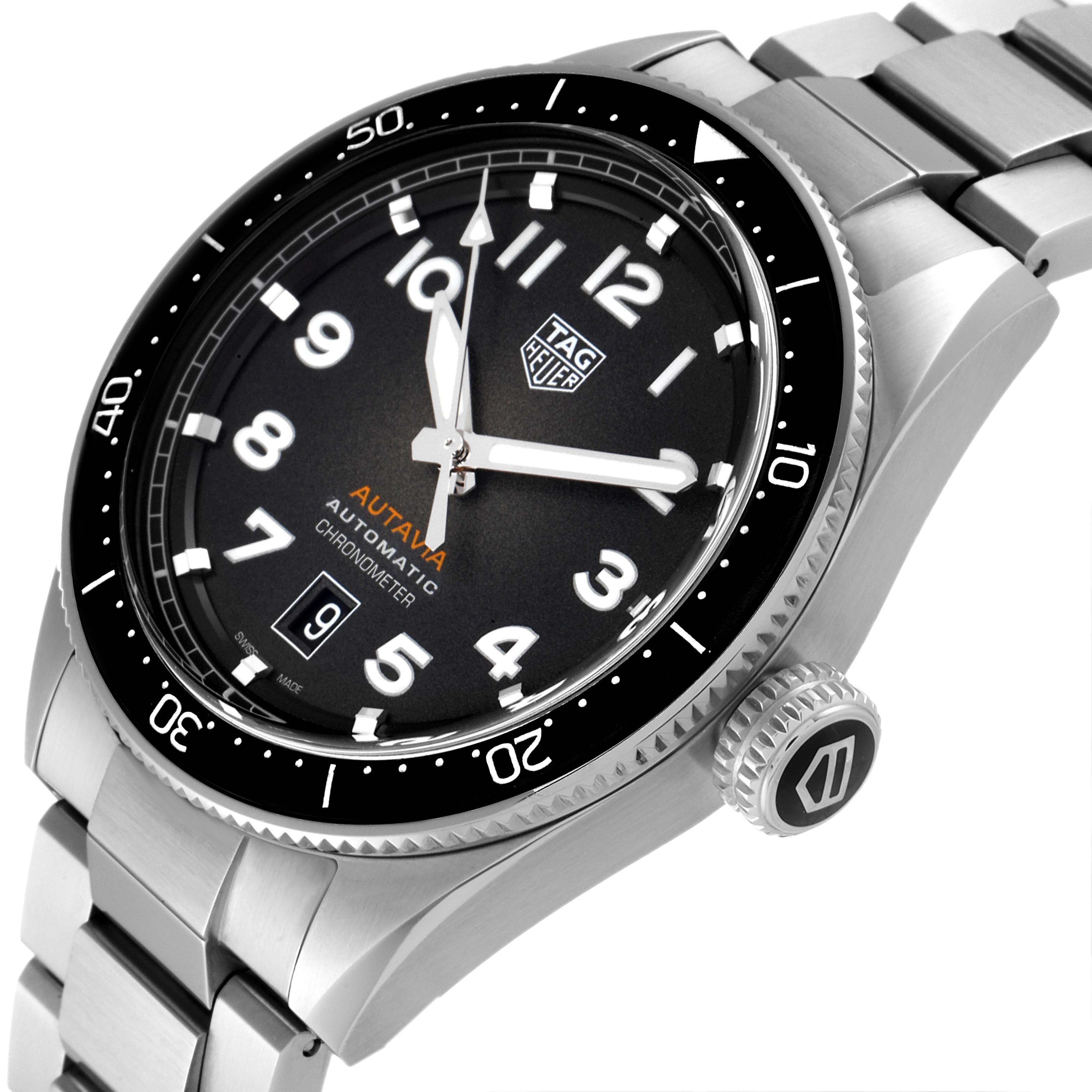 This image shows a close-up view of the Tag Heuer Autavia WBE5114.EB0173 Men's Stainless Steel Brown Dial WBE5114.EB0173 Men's Stainless Steel Brown Dial watch, highlighting its face, bezel, crown, and part of the bracelet.