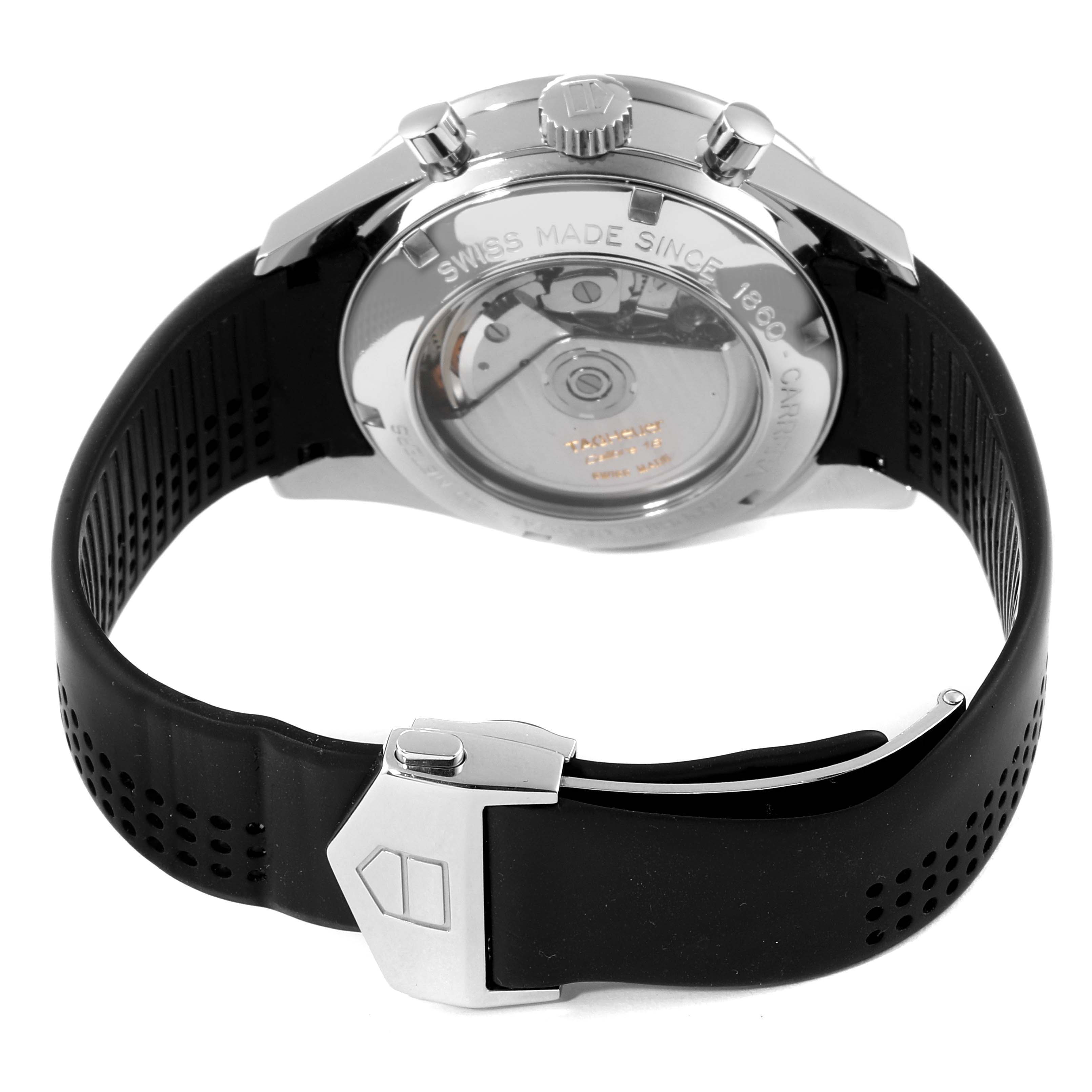 The image shows the back view of the Tag Heuer Carrera CV2014.FC6233 Men
s Stainless Steel Black Dial CV2014.FC6233 Men
s Stainless Steel Black Dial watch, focusing on the case back and the black rubber strap.