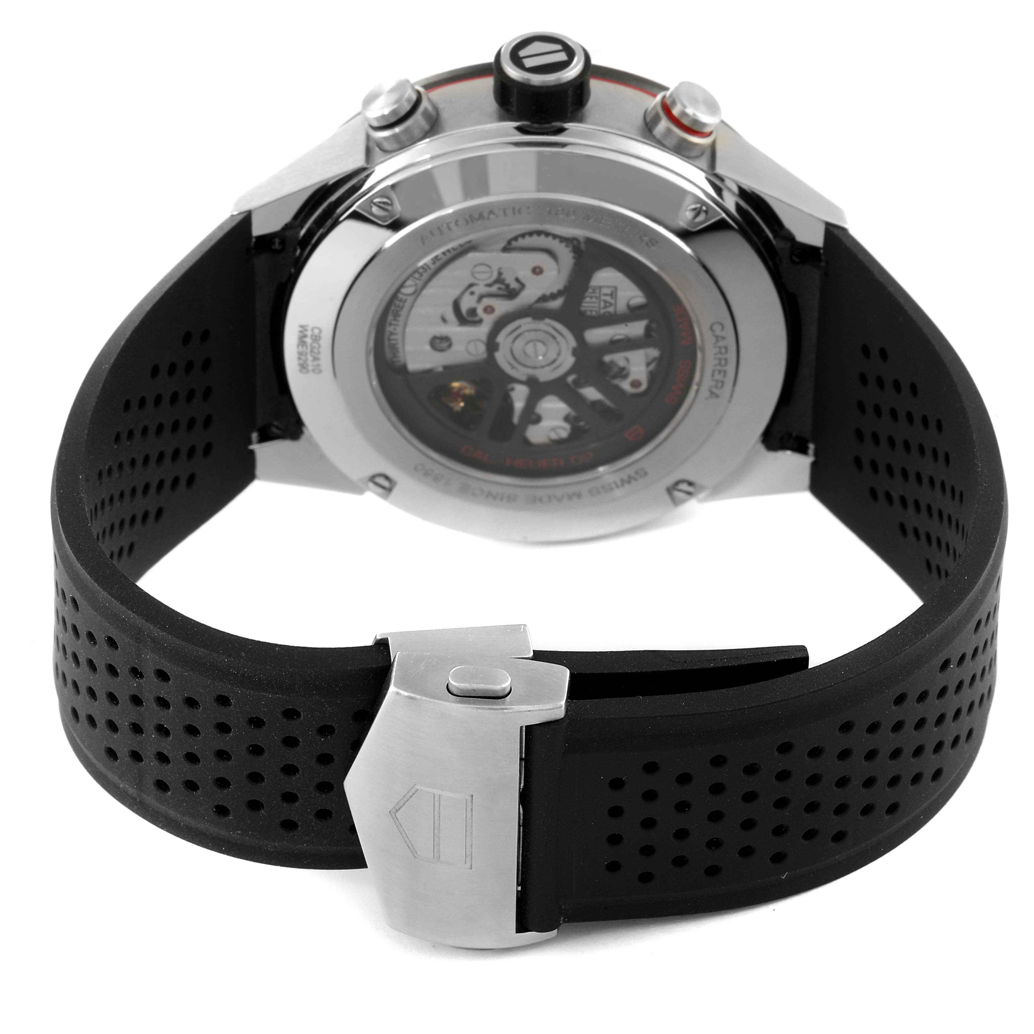 The image shows the back view of a Tag Heuer Carrera CBG2A10.FT6168 Men
s Stainless Steel Black Dial CBG2A10.FT6168 Men
s Stainless Steel Black Dial watch, highlighting its black rubber strap and visible movement through the caseback.