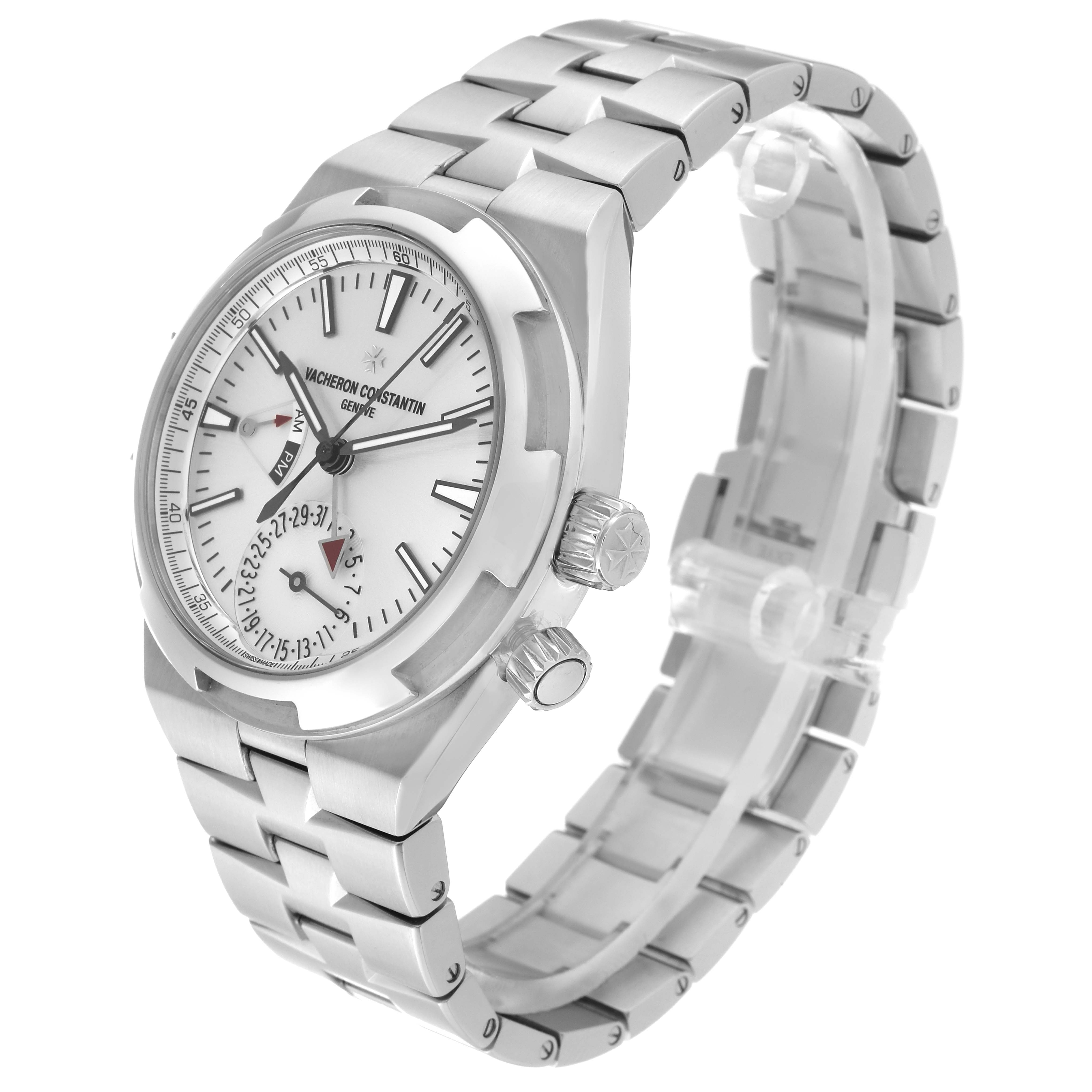 The image shows a Vacheron Constantin Overseas 7900V/110A Men's Stainless Steel Silver Dial 7900V/110A Men's Stainless Steel Silver Dial watch at an angled view, highlighting its face, crown, and stainless steel bracelet.