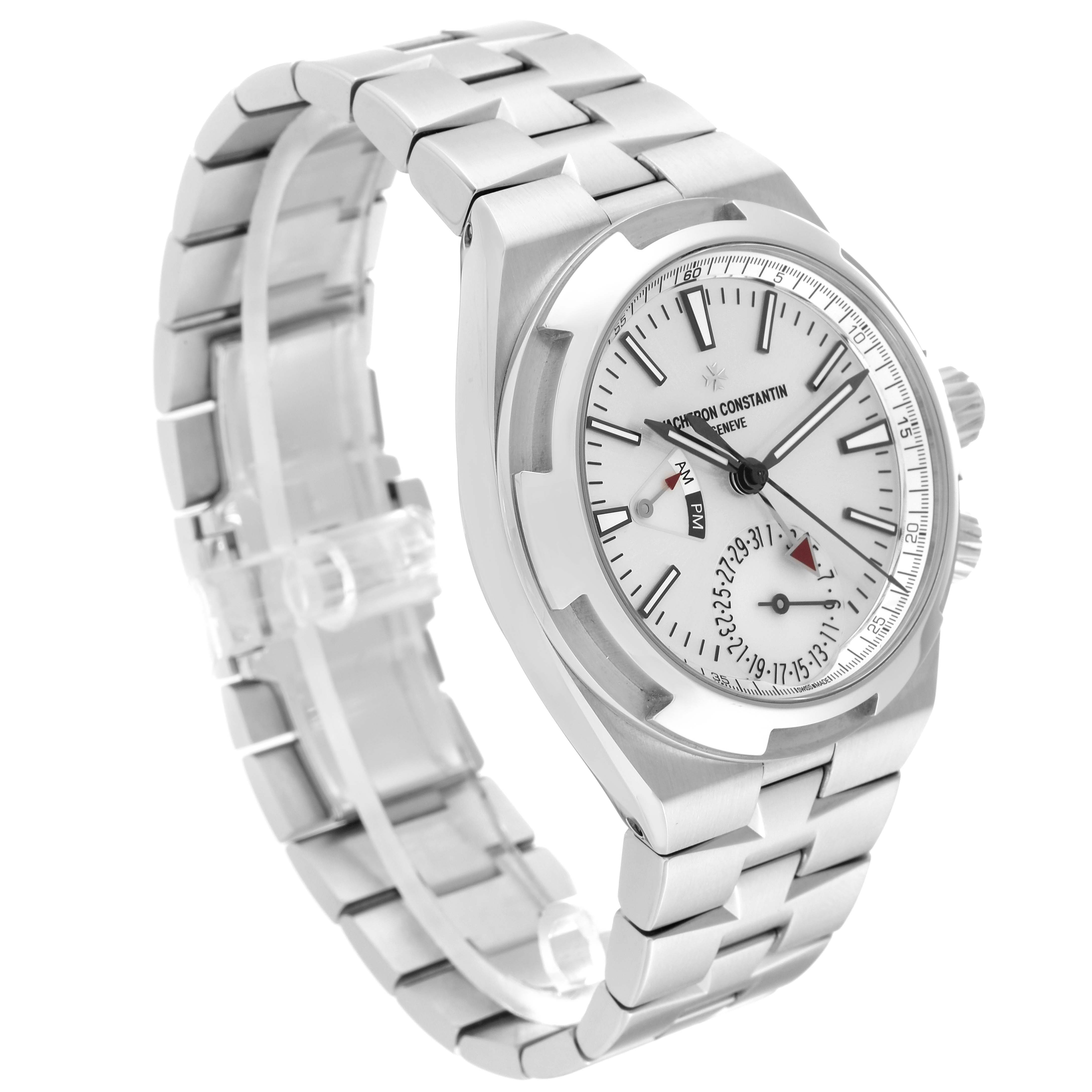 The Vacheron Constantin Overseas 7900V/110A Men's Stainless Steel Silver Dial 7900V/110A Men's Stainless Steel Silver Dial watch is shown at a left-side angle, displaying the face, bracelet, and crown.