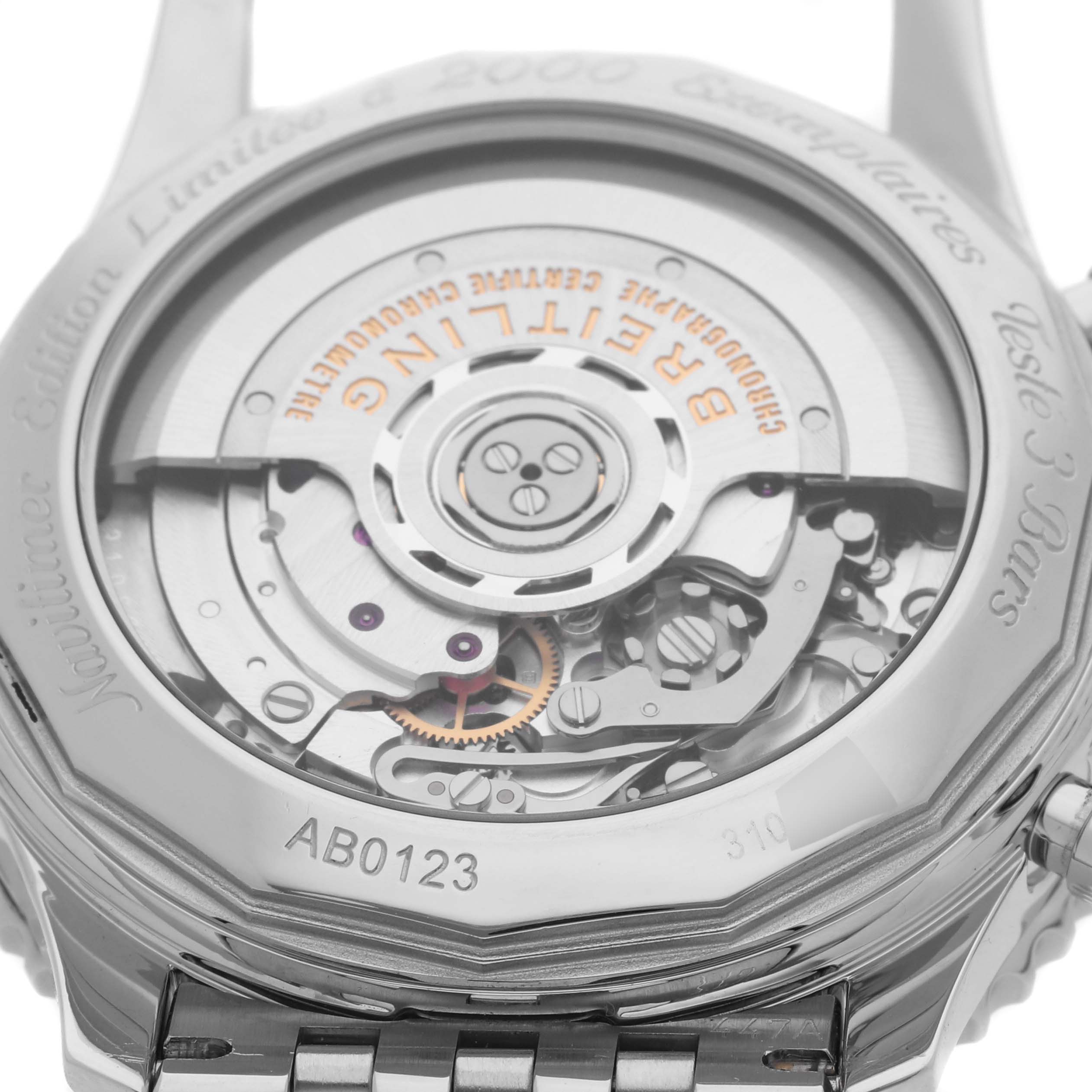 The image shows the case back of a Breitling Navitimer AB0123 Men's Stainless Steel Silver Dial AB0123 Men's Stainless Steel Silver Dial watch, revealing its mechanical movement.
