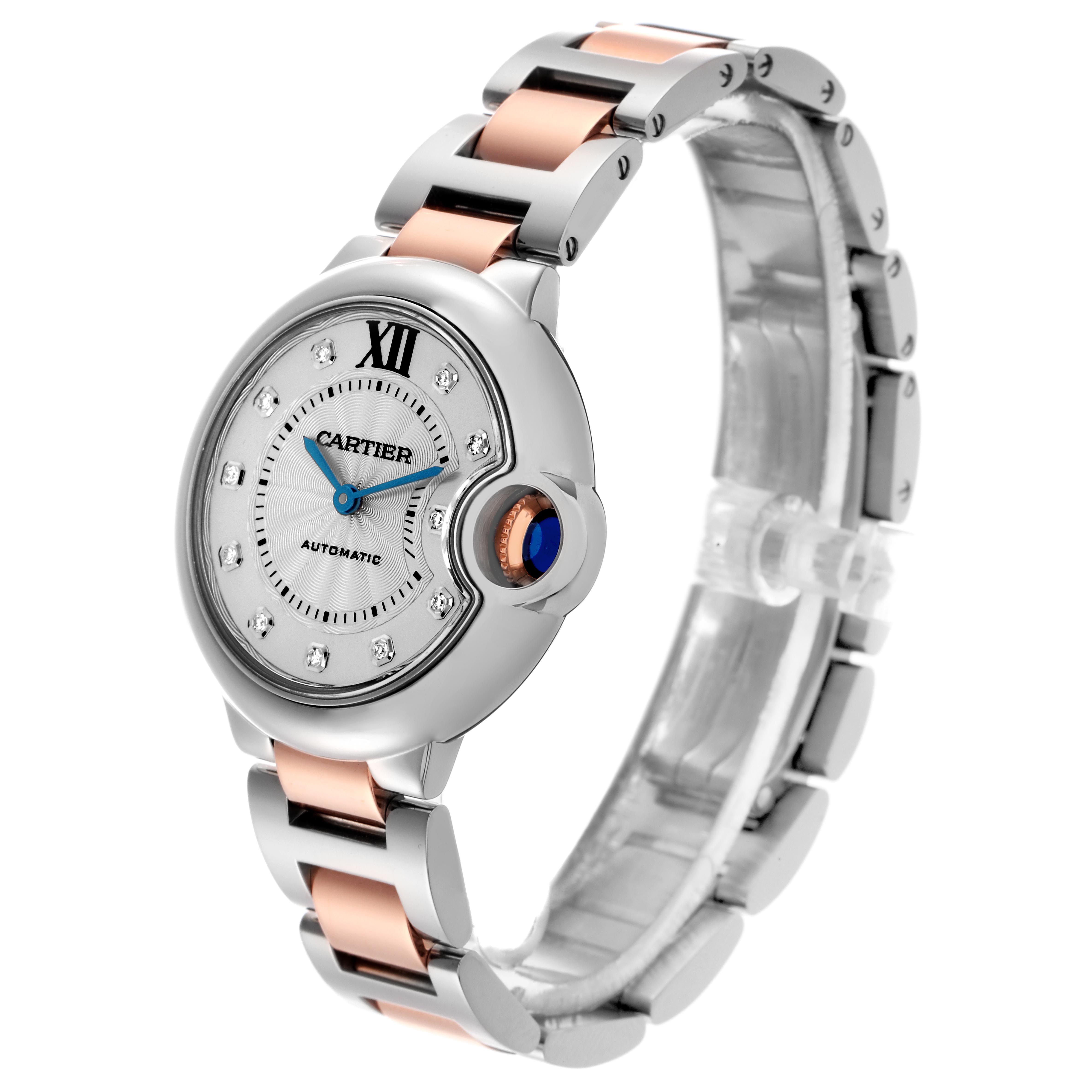 The Cartier Ballon Bleu WE902044 Women's Steel and Gold (two tone) Silver Dial WE902044 Women's Steel and Gold (two tone) Silver Dial watch is shown at a three-quarter angle, highlighting the face, crown, and bracelet.