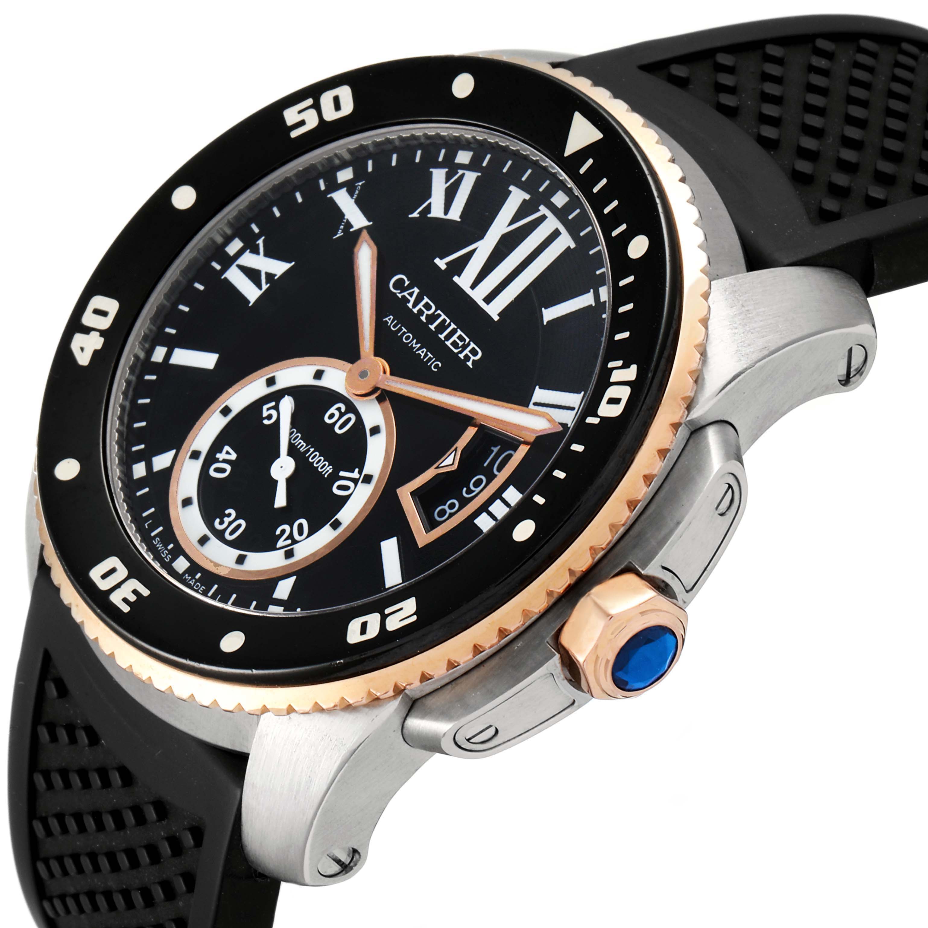 The image shows a Calibre de Cartier watch by Cartier at an angle, highlighting the dial, bezel, crown, and part of the strap.