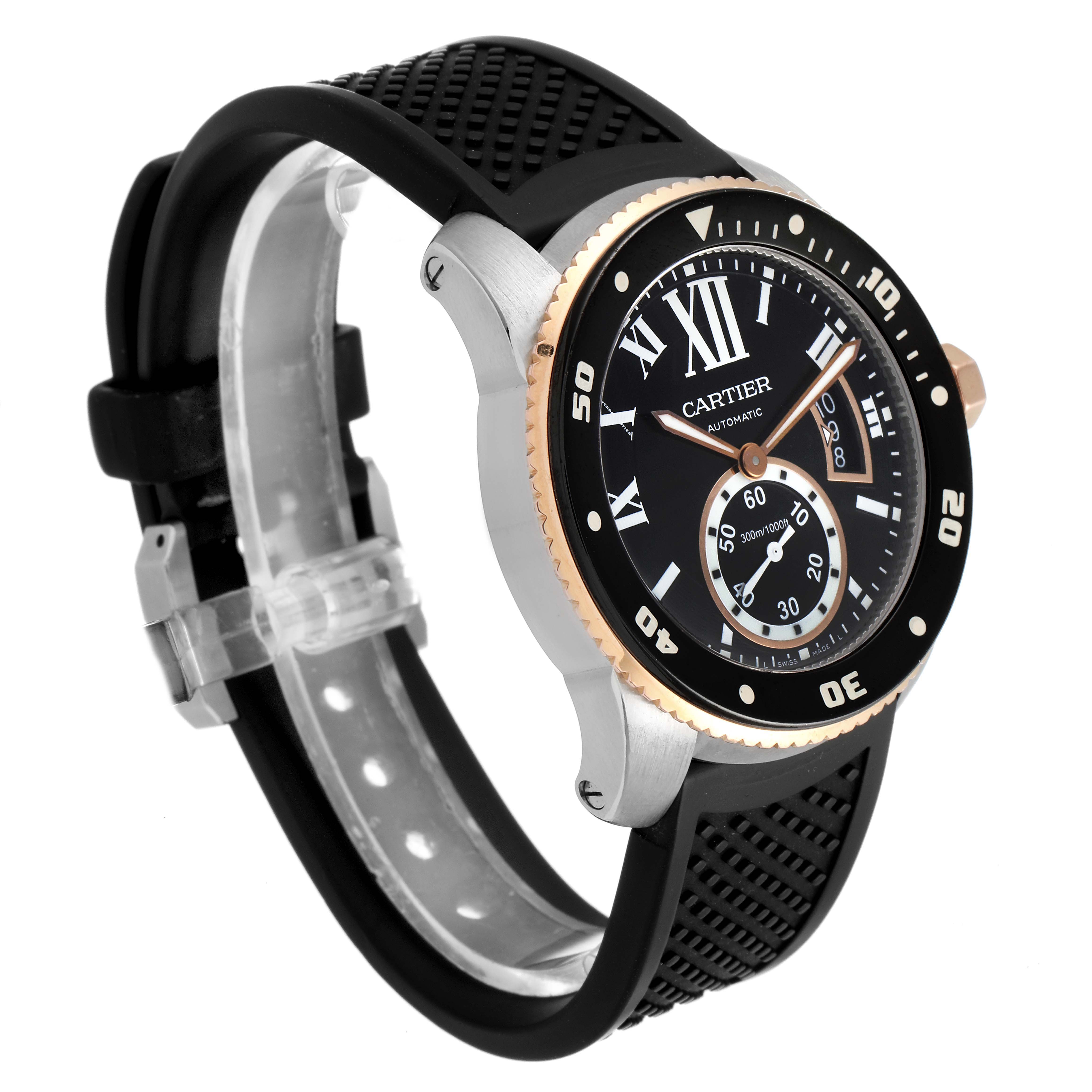 This image displays a Calibre de Cartier model by Cartier from a three-quarter angle, highlighting the watch face, band, and bezel.