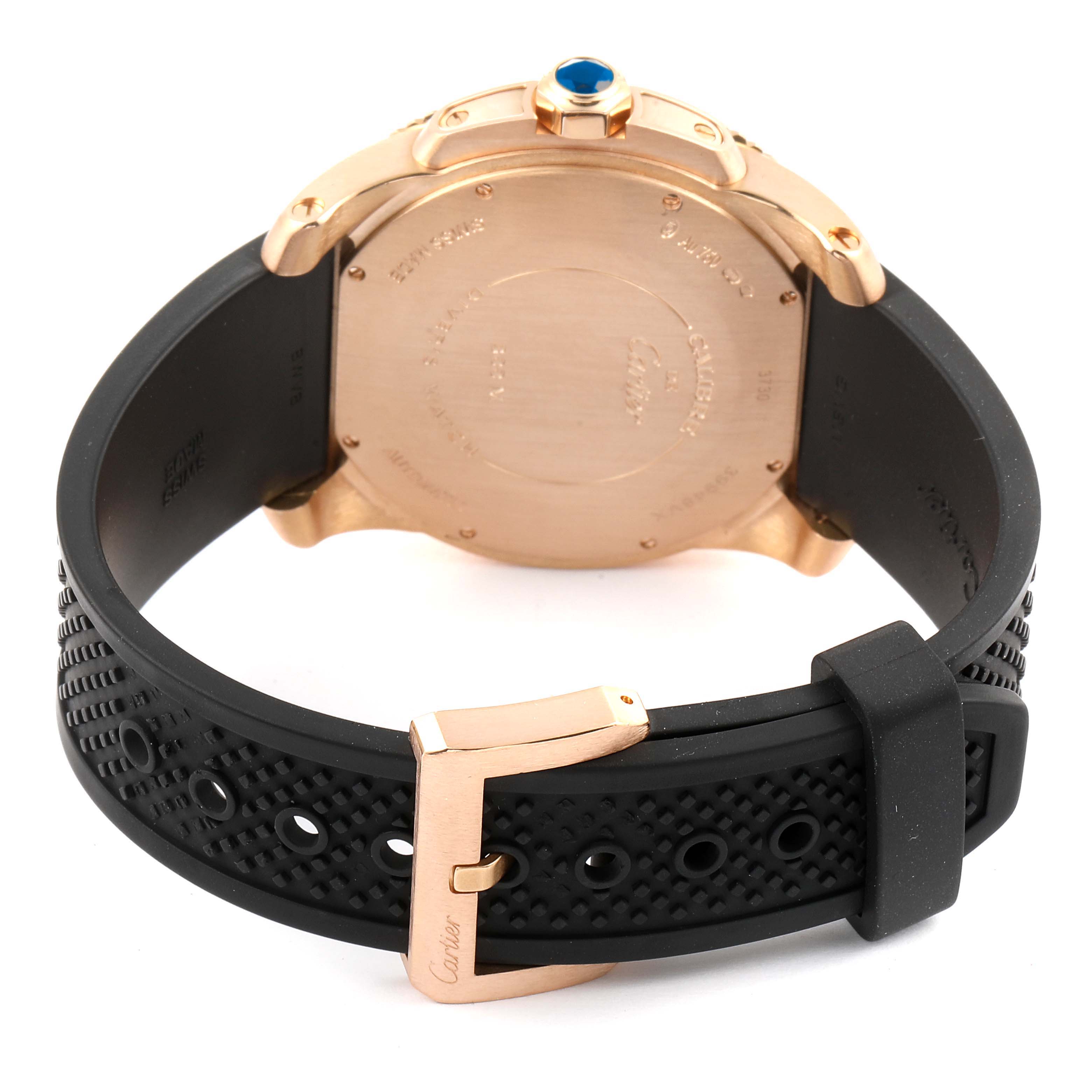 The image shows the back case and buckle of a Calibre de Cartier watch by Cartier.