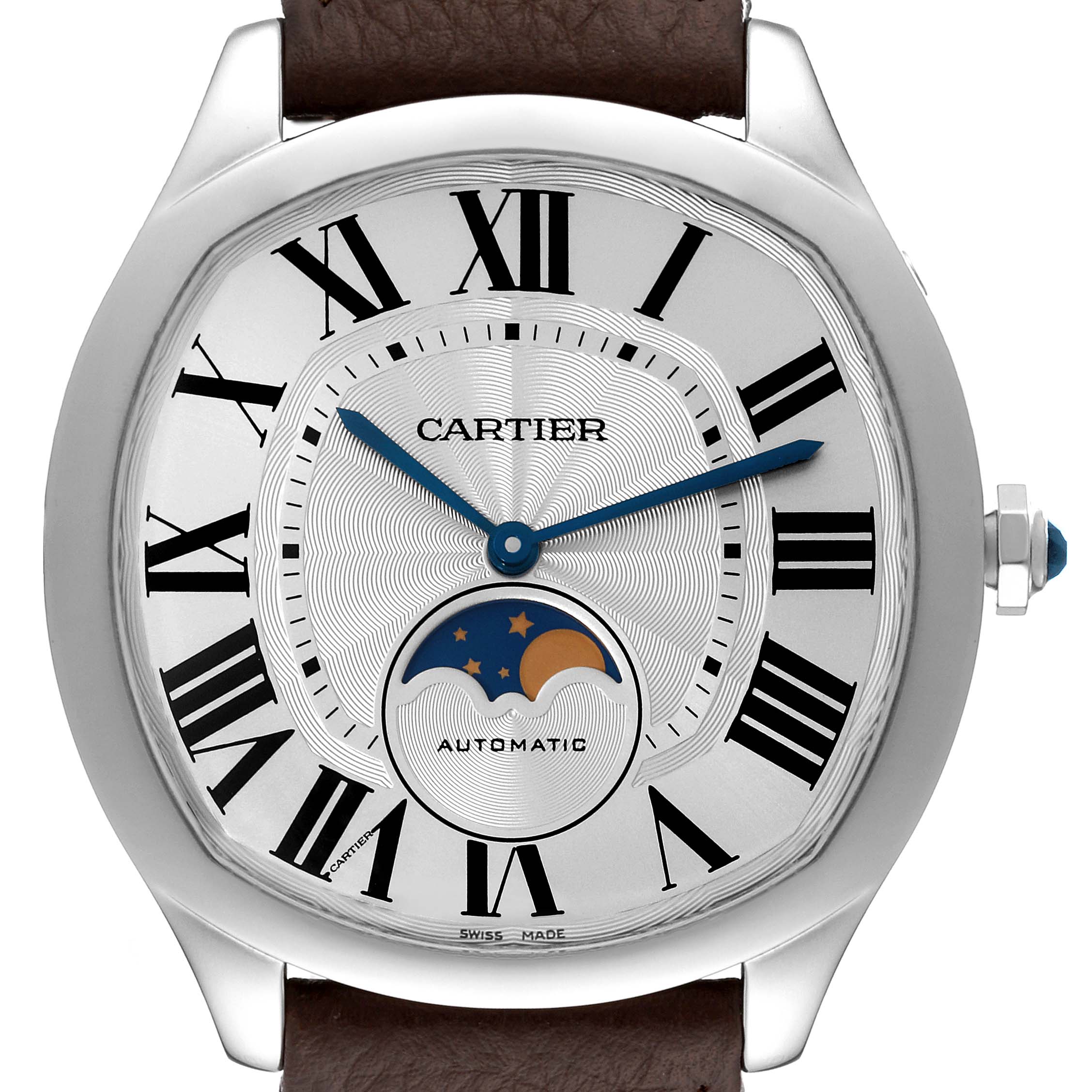 The image shows a close-up of the face and bezel of the Drive de Cartier watch by Cartier, highlighting its Roman numerals, moon phase display, and blue hands.