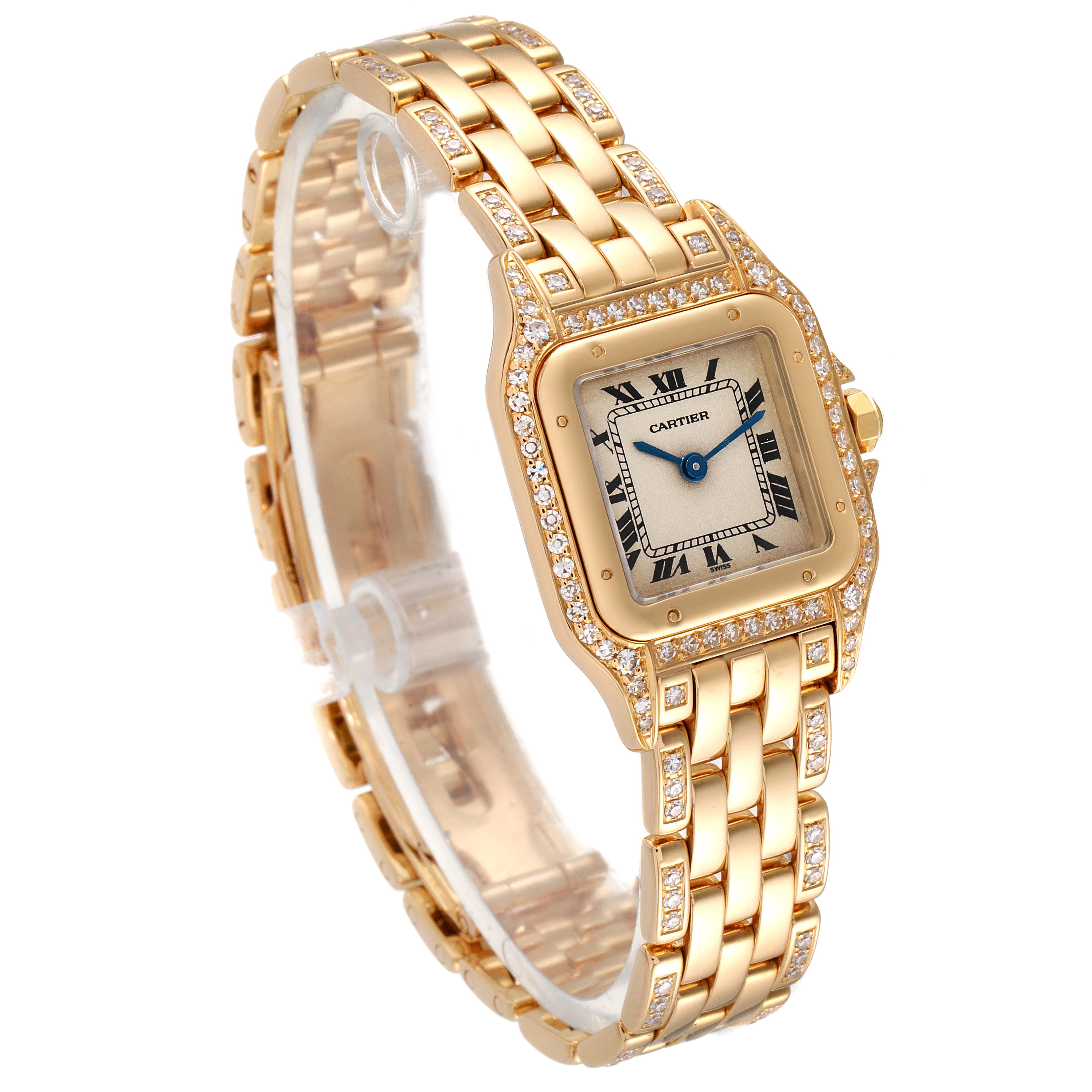 The image shows a Cartier Panthere Women's Yellow Gold Silver Dial Women's Yellow Gold Silver Dial watch at an angle highlighting its gold bracelet and diamond-encrusted bezel.